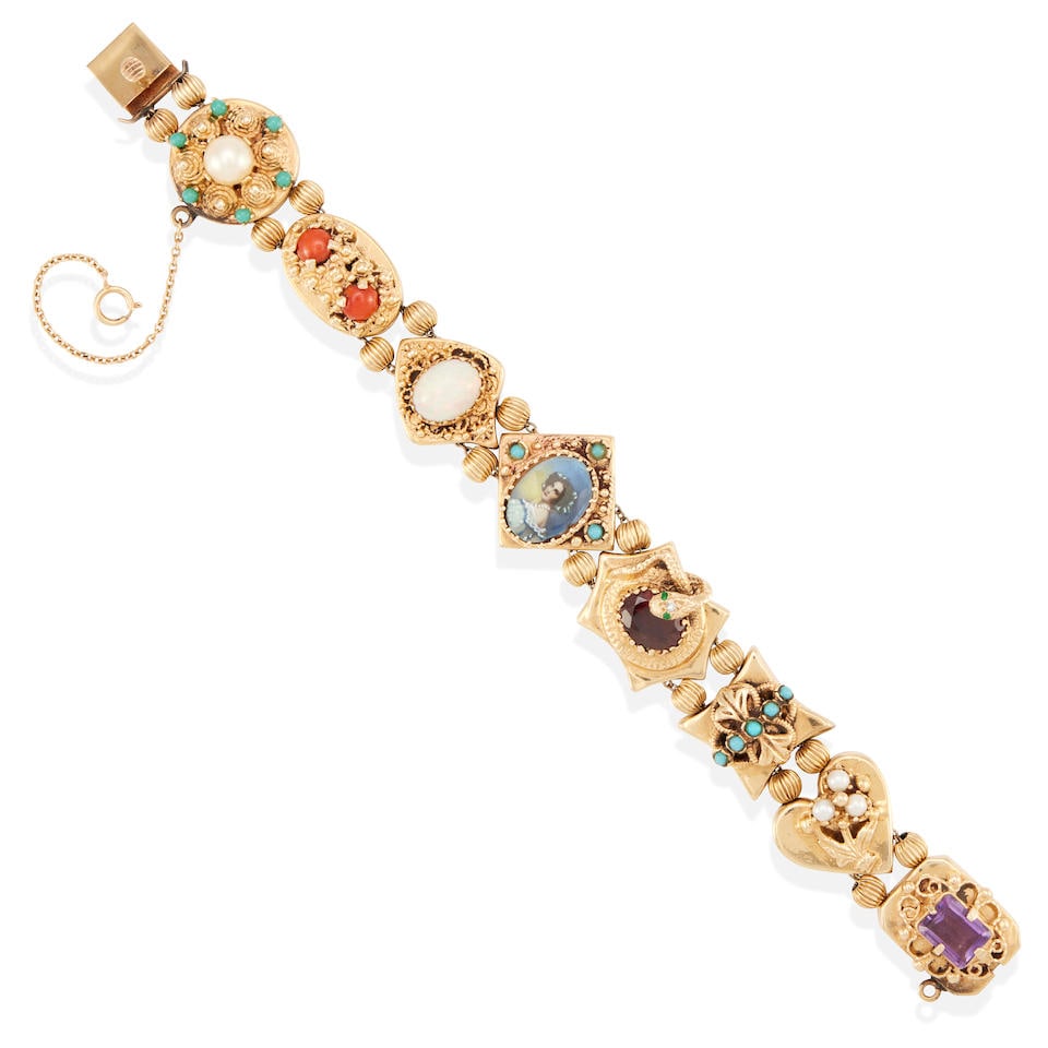 A 14K GOLD AND GEM-SET SLIDE BRACELET (1 of 2)