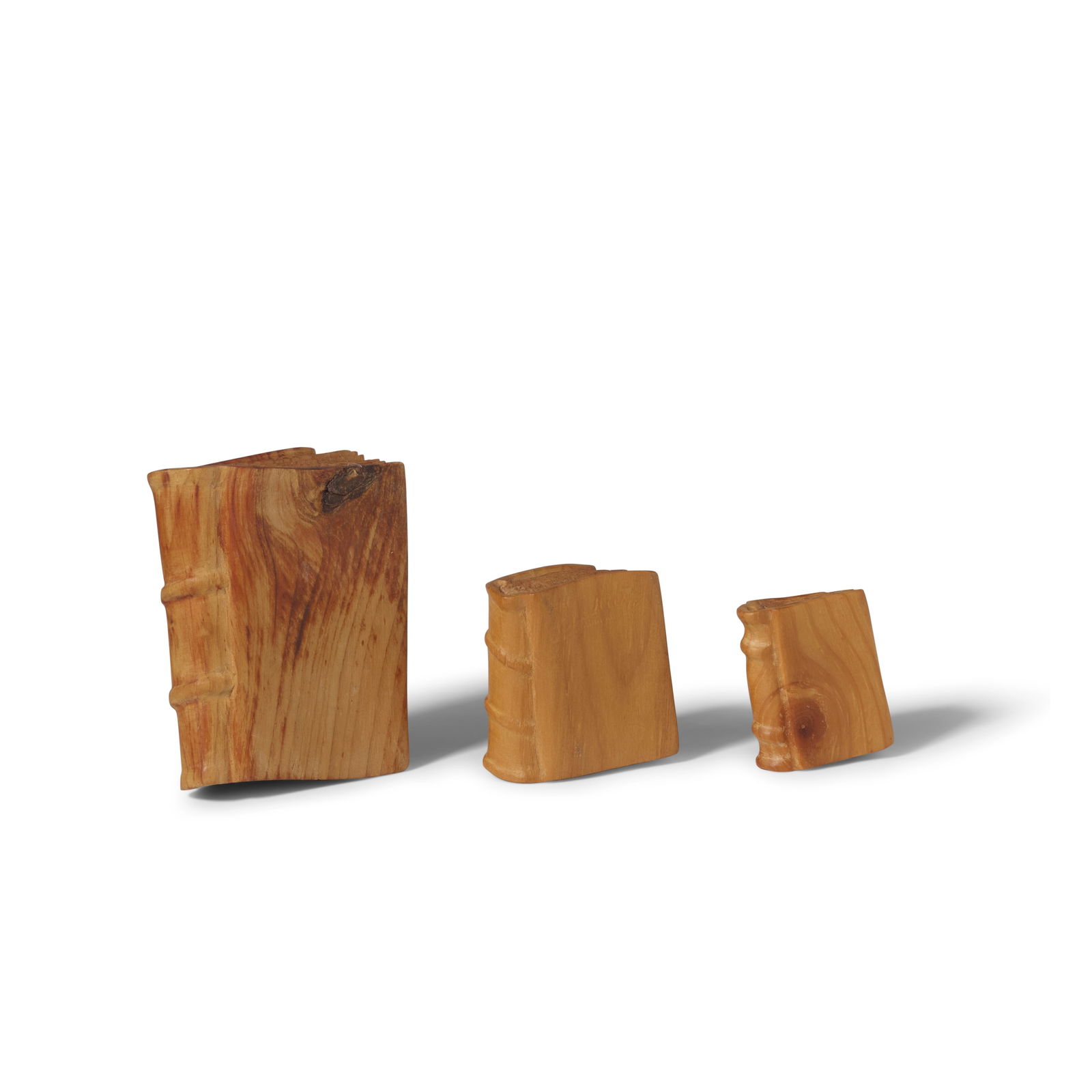 LIVIO DE MARCHI (BORN 1943) Group of Three Miniature Books sculpted pine, each incised 'LIVIO'he... (1 of 2)