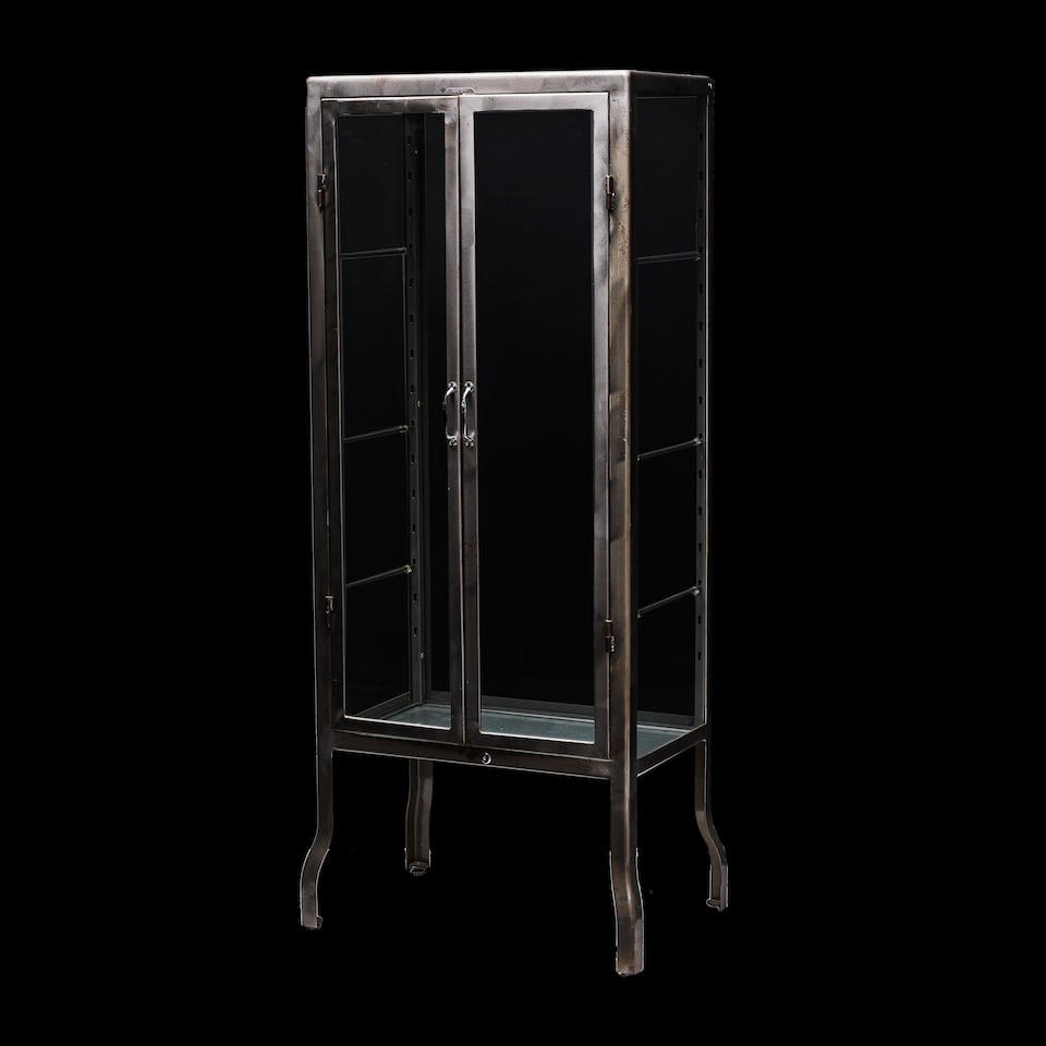 Metal Mineral Cabinet: Metal Mineral Cabinet A tall metal cabinet with glass doors, suitable for displaying a collection of minerals. Measuring 65 x 25 1/2 x 15 1/2 in Lot to be sold without reserve. This lot is subject to 