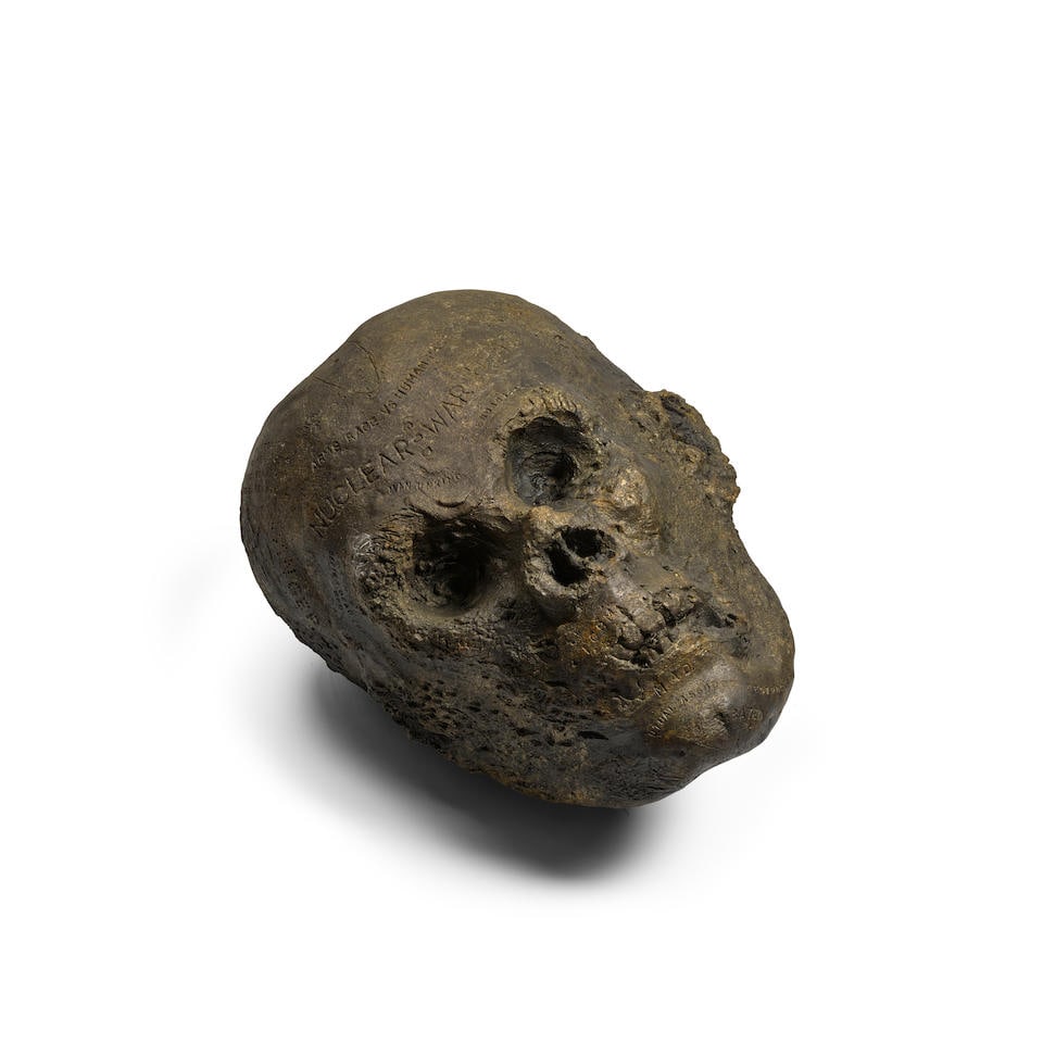 Robert Arneson (1930-1992) Nuke News 1983: Robert Arneson (1930-1992) Nuke News 1983 bronze 26 by 22 by 19 in. 66 by 59 by 48.3 cm. For further information on this lot please visit Bonhams.com For further information about this lot please