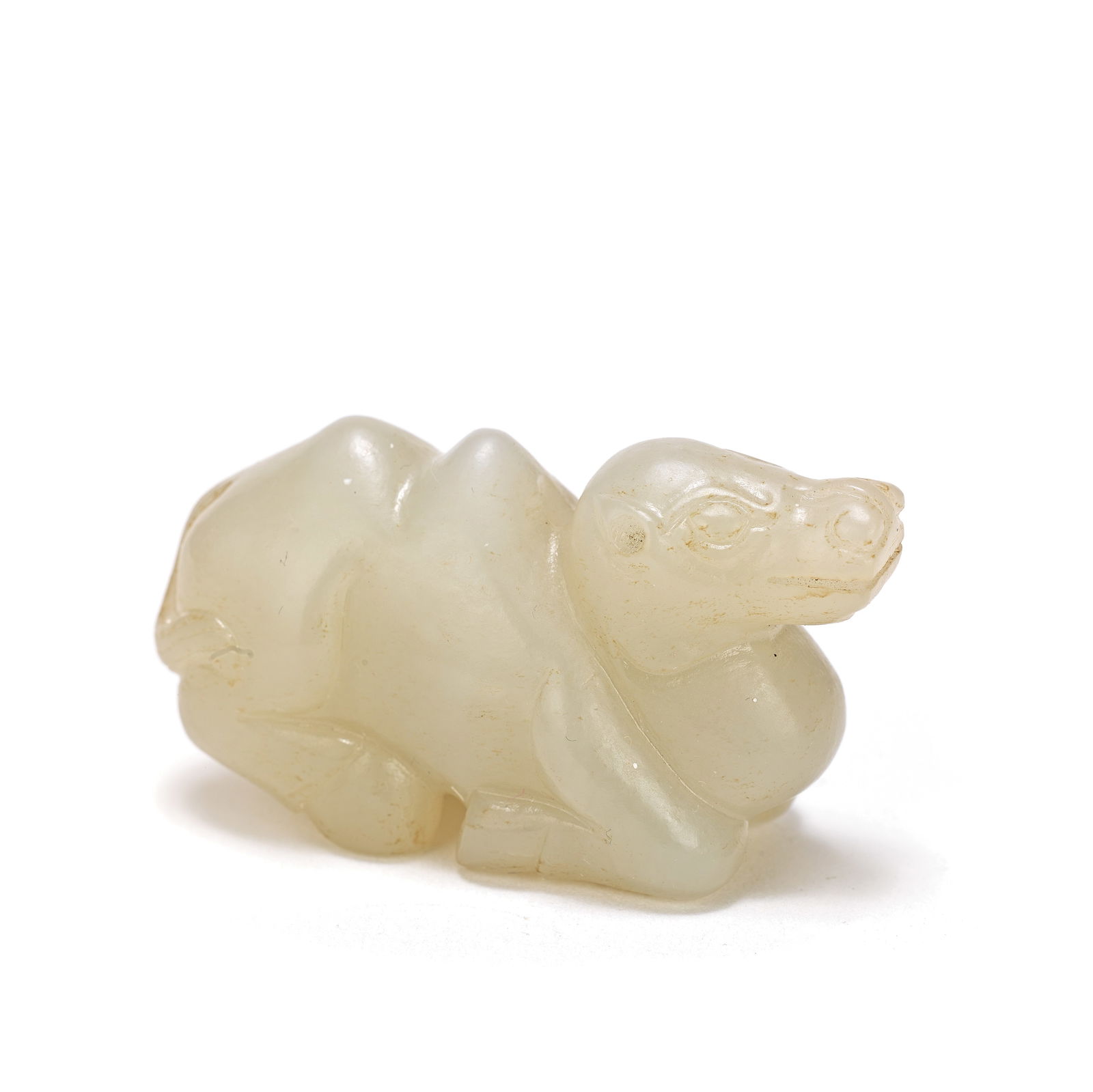 A PALE GREEN JADE 'RECUMBENT CAMEL' PENDANT Qing Dynasty (1 of 1)