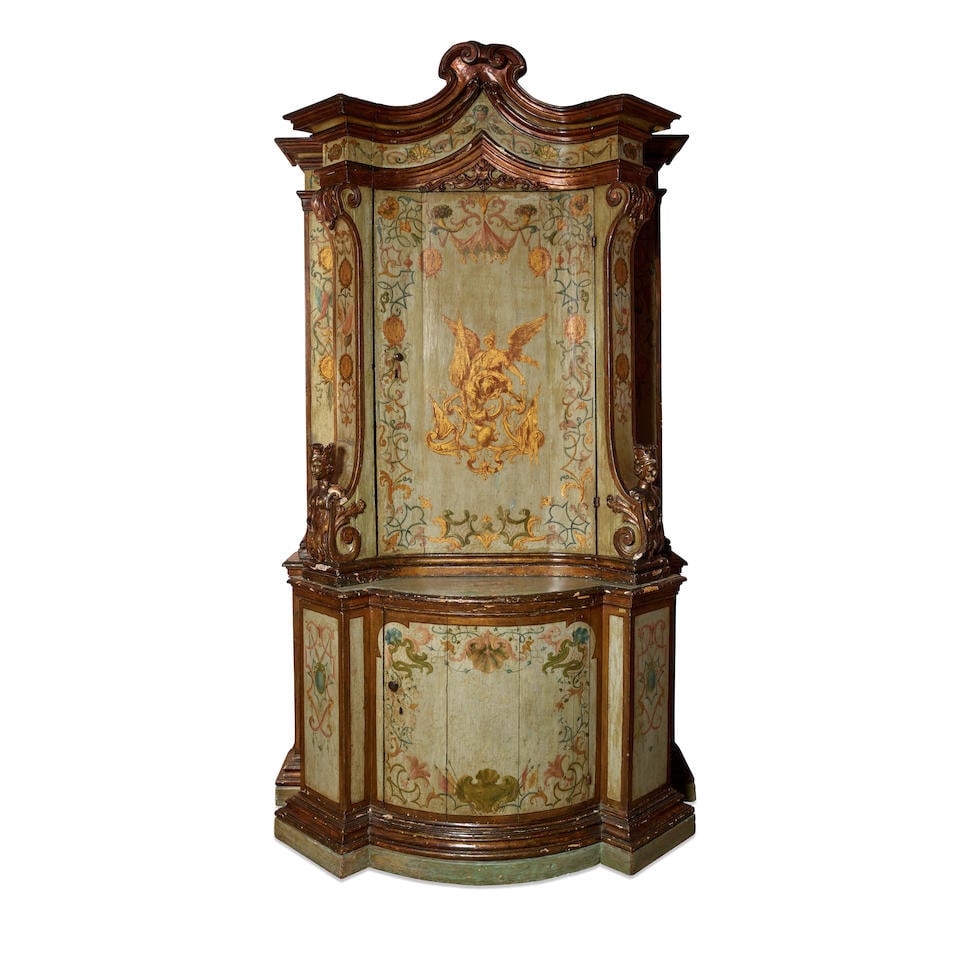 AN ITALIAN BAROQUE POLYCHROME PAINTED AND GILTWOOD CABINET18th century (1 of 2)
