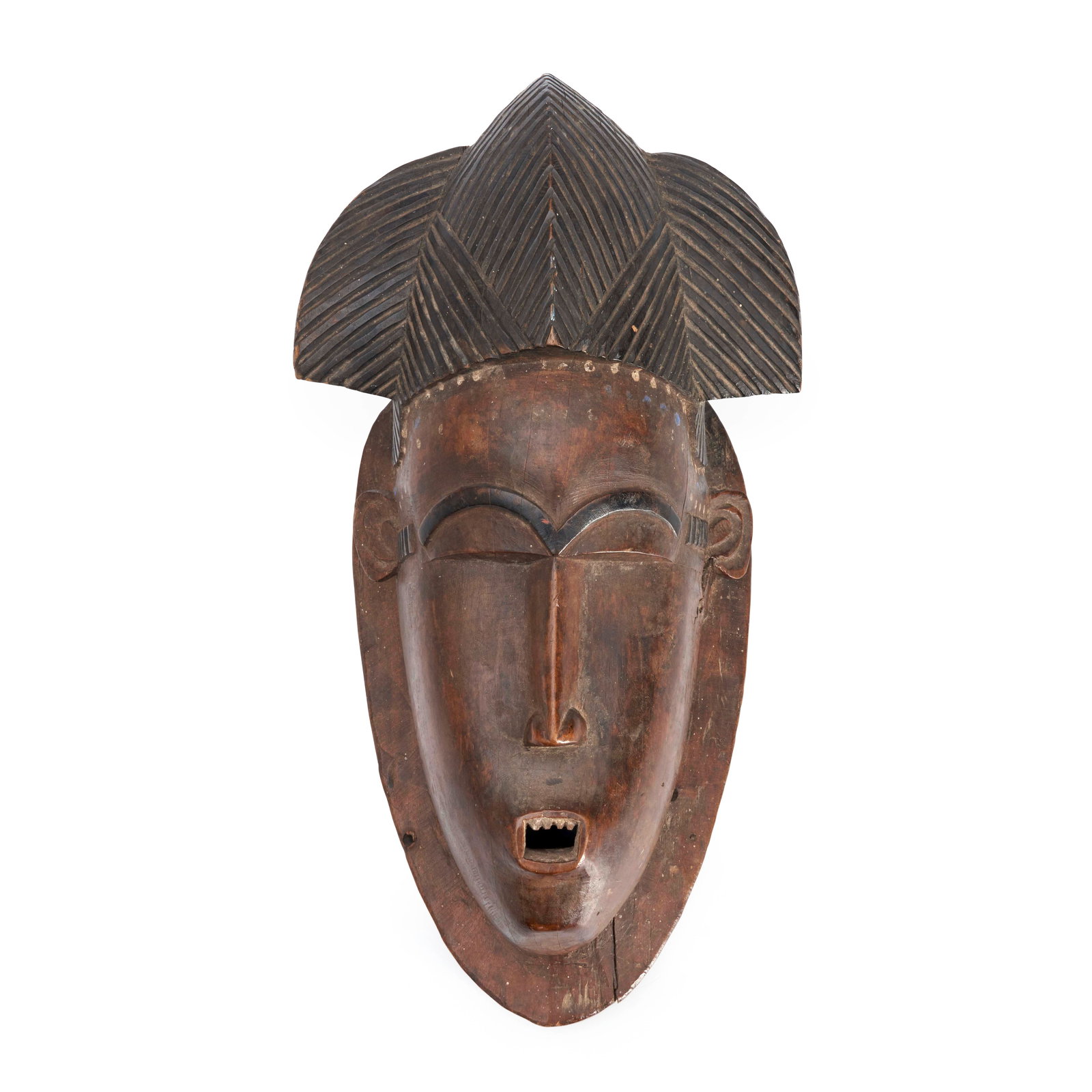 A Baule face mask ht. 15, wd. 6 3/4 in.: A Baule face mask Ivory Coast, hollowed-out portrait mask, with yoke collar around the neck, pointed chin, a square, protruding open mouth with teeth, an elongated raised nose, the eyes closed below a