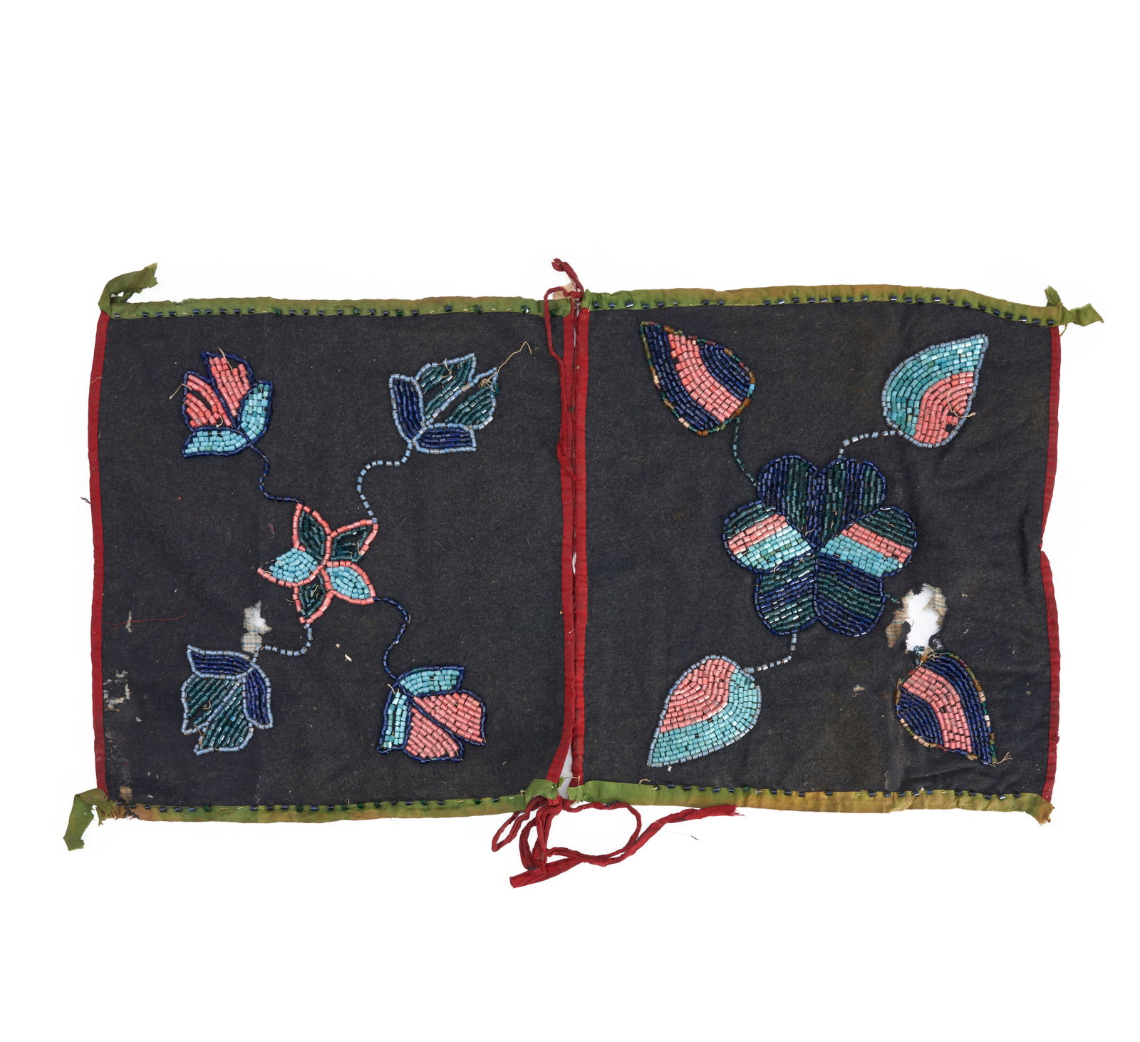 A Great lakes breech clout each panel 18 x 17 in.: A Great lakes breech clout Mamaceqtaw (Menominee), two square cloth panels, each decorated with multicolored tube beads in floriate designs. each panel 18 x 17 in. Footnotes: Provenance: The Roy H. R