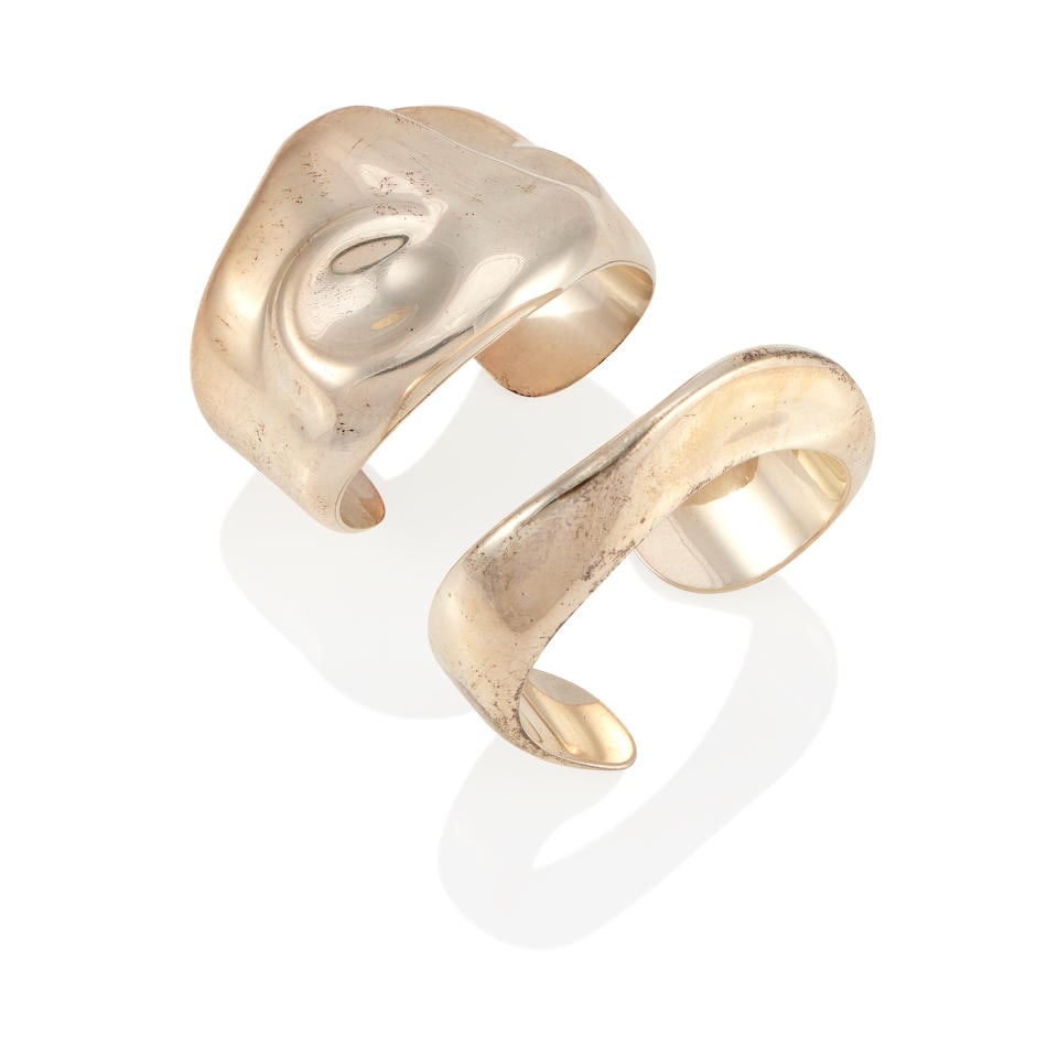 ELSA PERETTI FOR TIFFANY & CO.: TWO SILVER 'SWIRL' AND 'TAURUS' CUFF BRACELETS (1 of 2)