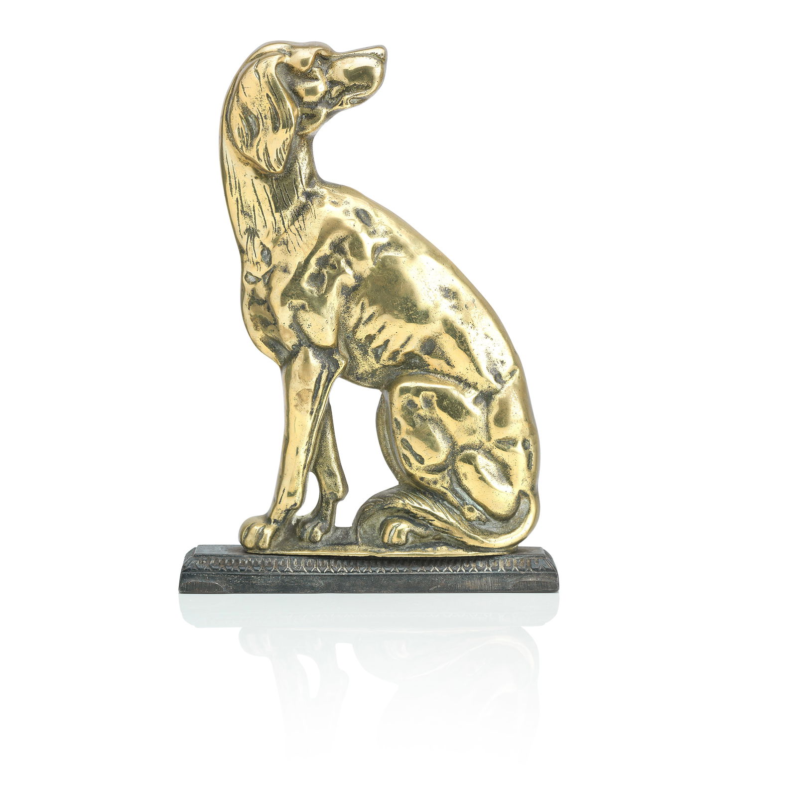 A late 19th early 20th century brass and cast iron dog door-stop: A late 19th early 20th century brass and cast iron dog door-stopCast with its head turned over its shoulder, raised on a cast iron plinth, 22cm wide, 6cm deep, 32cm high (8 1/2in wide, 2in deep, 12 1/