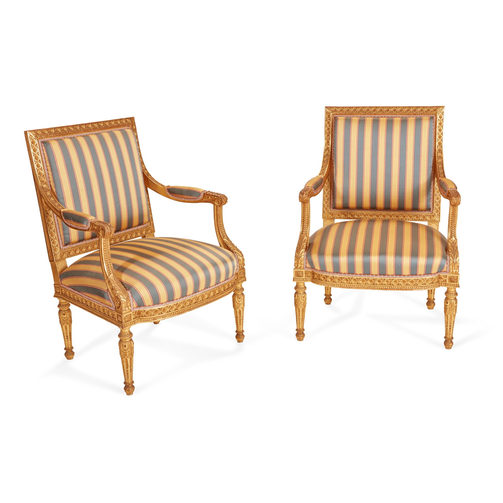 A PAIR OF LOUIS XVI STYLE CARVED AND GILTWOOD FAUTEUILS À LA REINE: A PAIR OF LOUIS XVI STYLE CARVED AND GILTWOOD FAUTEUILS À LA REINE height 38in (97cm); width 27in (69cm); depth 25 1/2in (65cm) Saleroom Notice: This lot to be sold without reserve