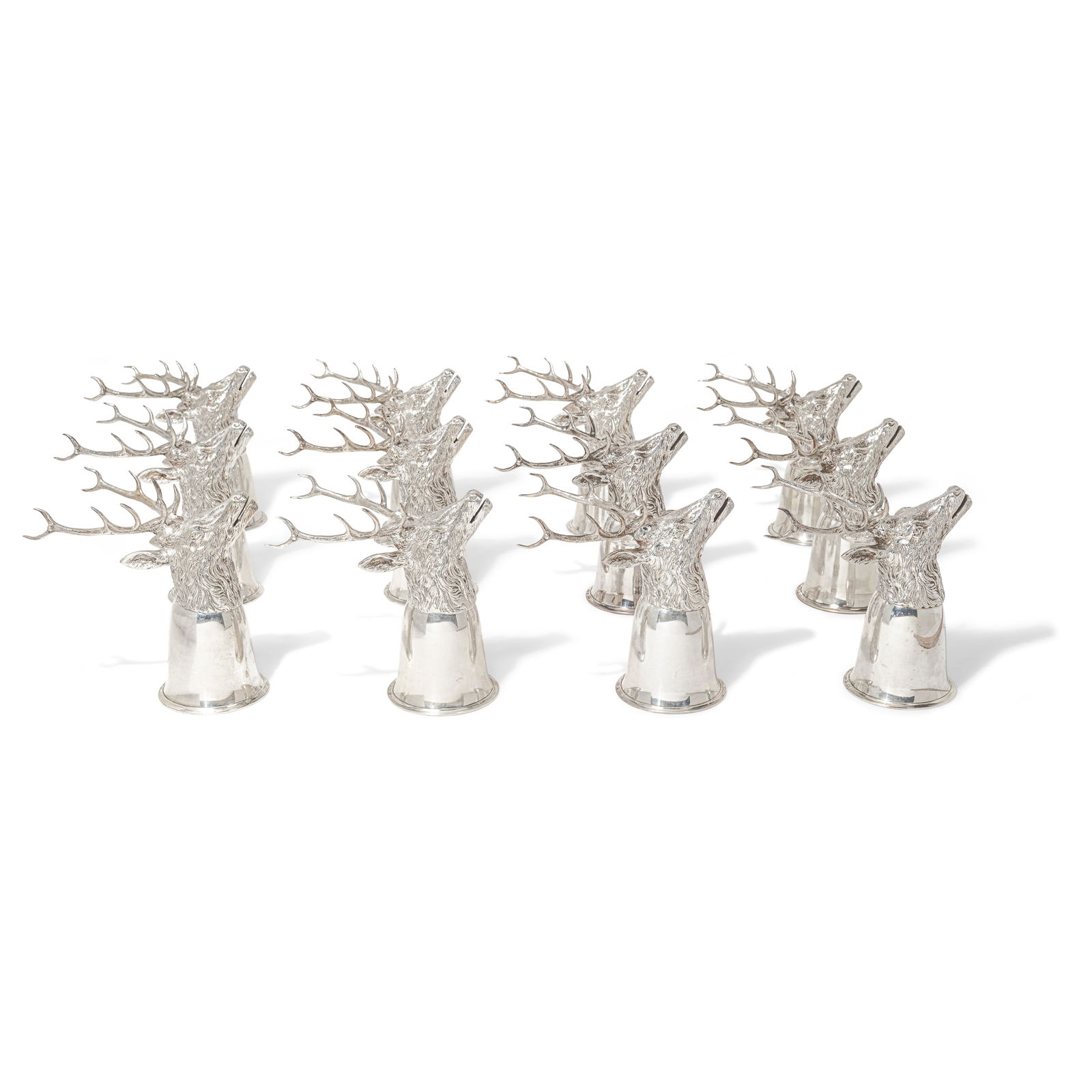 A SET OF TWELVE GUCCI 800 SILVER STAG HEAD-FORM STIRRUP CUPS signed Gucci, Italy, circa 1970 (1 of 4)
