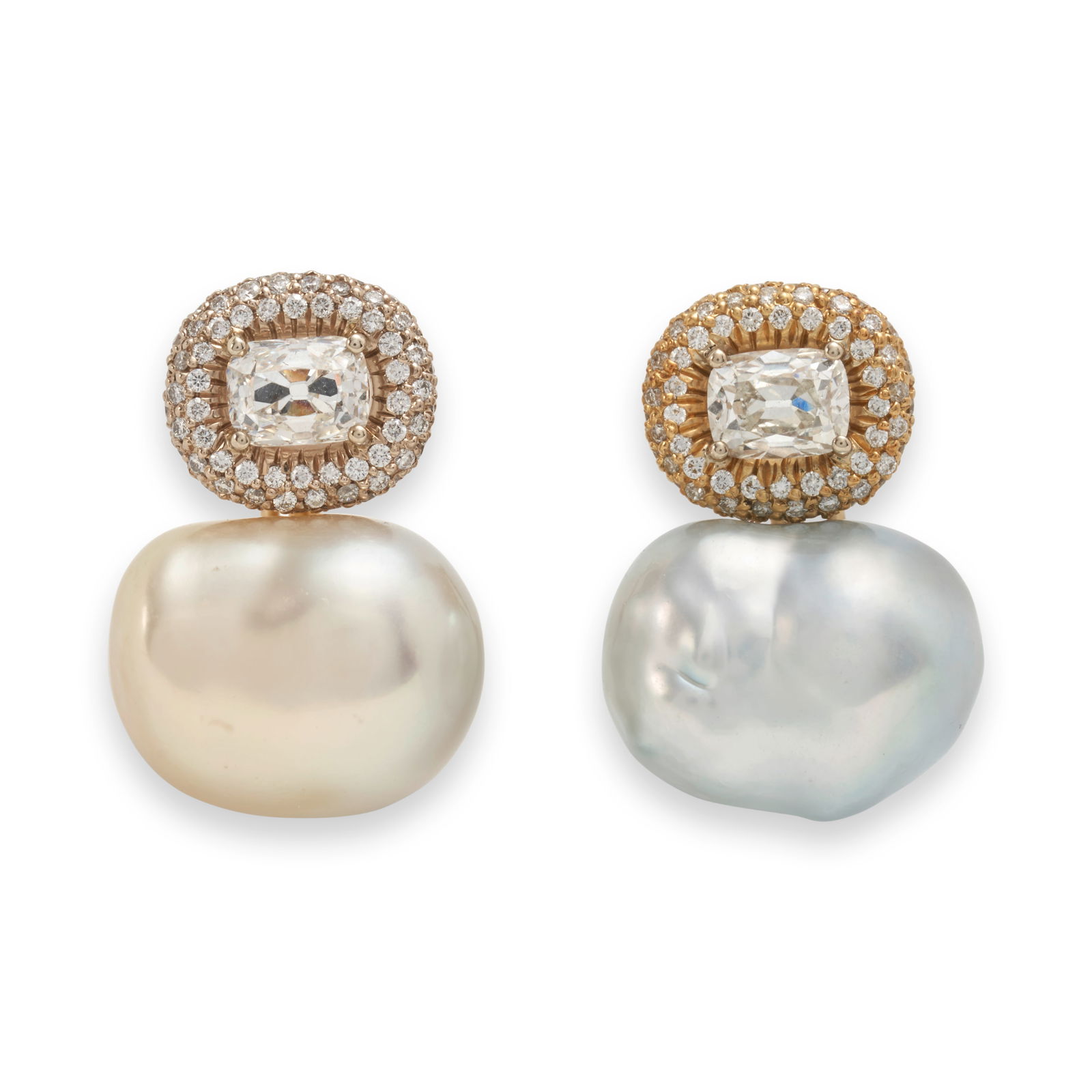 DONNA VOCK: A PAIR OF BAROQUE SOUTH SEA PEARL AND DIAMOND EARCLIPS: DONNA VOCK: A PAIR OF BAROQUE SOUTH SEA PEARL AND DIAMOND EARCLIPS Designed as golden and silver baroque pearls surmounted by fancy-cut diamonds in pave-set diamond frames, approximate total diamond w