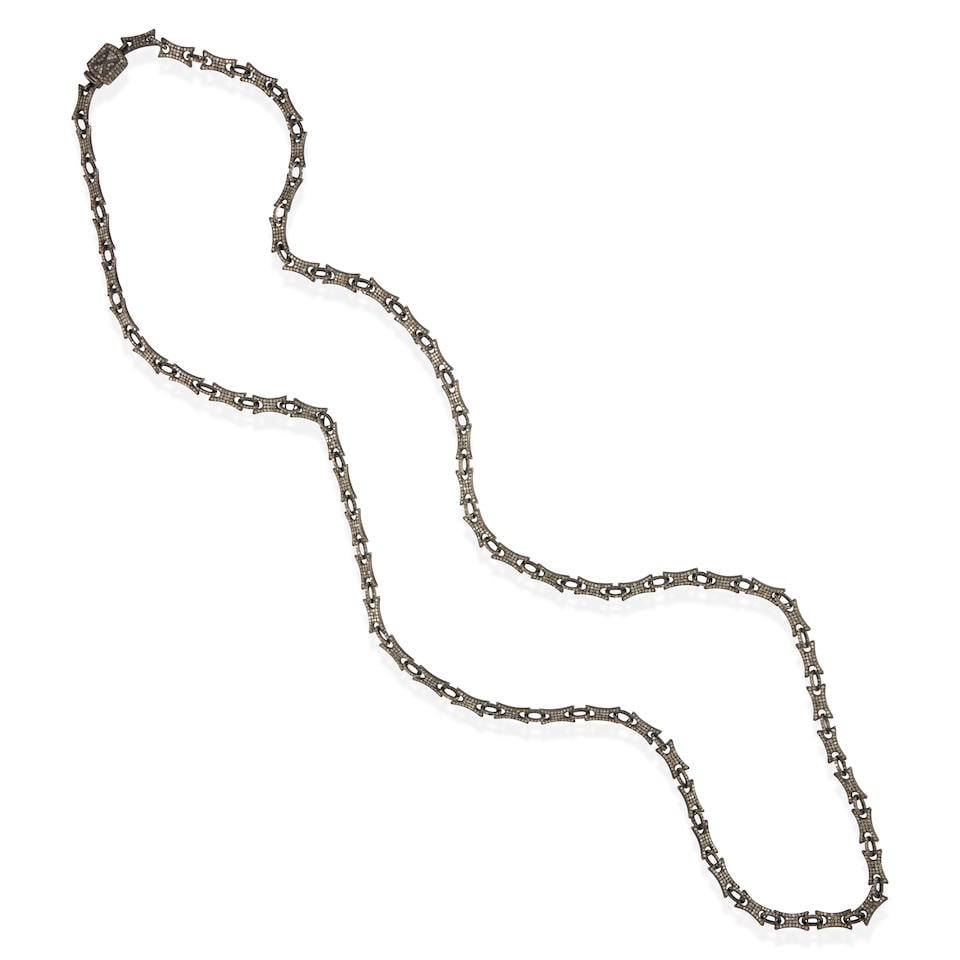 A SILVER AND DIAMOND NECKLACE (1 of 2)