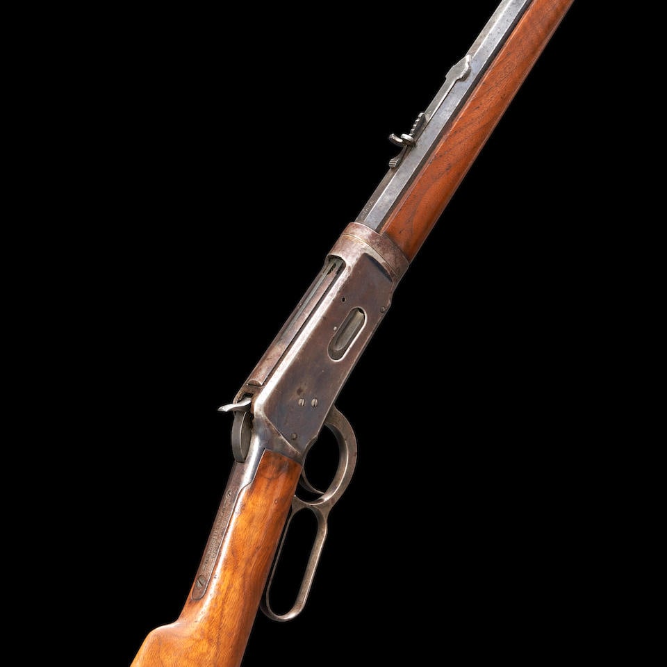Winchester Model 1894 Lever-action Takedown Rifle, Curio or Relic firearm: Winchester Model 1894 Lever-action Takedown Rifle, 1899. Serial number 63163, .30 W.C.F. caliber, octagonal barrel with proper roller engraved markings, adjustable rear sight, frame with traces of blu
