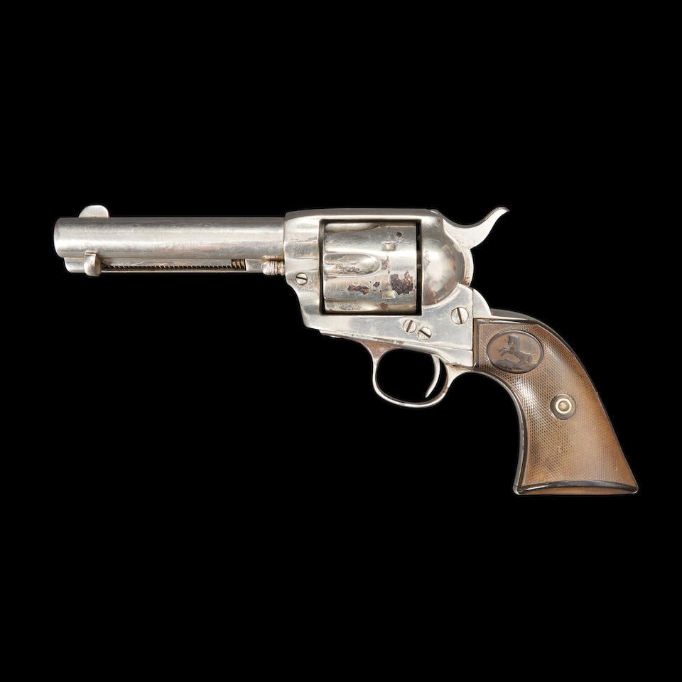 Colt Single-action Army Revolver,: Colt Single-action Army Revolver, 1898. Serial number 177552, .41 WCF caliber, refinished nickel-plated revolver, the markings very thin or entirely lacking, checkered black hard rubber grips with ram