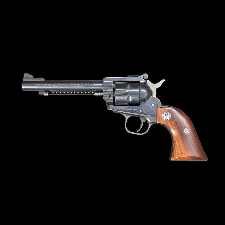 Ruger New Model Single-Six Revolver, Modern handgun: Ruger New Model Single-Six Revolver, 1982. Serial number 69-71742, .22 caliber, dark blued steel barrel, frame and cylinder with proper roller engraved markings, adjustable rear sight, walnut grip wit