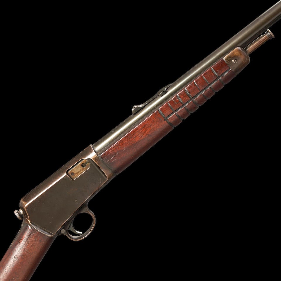 Winchester Model 03 Semi-automatic Rifle, Curio or Relic firearm: Winchester Model 03 Semi-automatic Rifle, 1931. Serial number 123853, .22 caliber, barrel with adjustable rear sight and proper roller engraved markings, walnut stock with lightly scratched heart and 