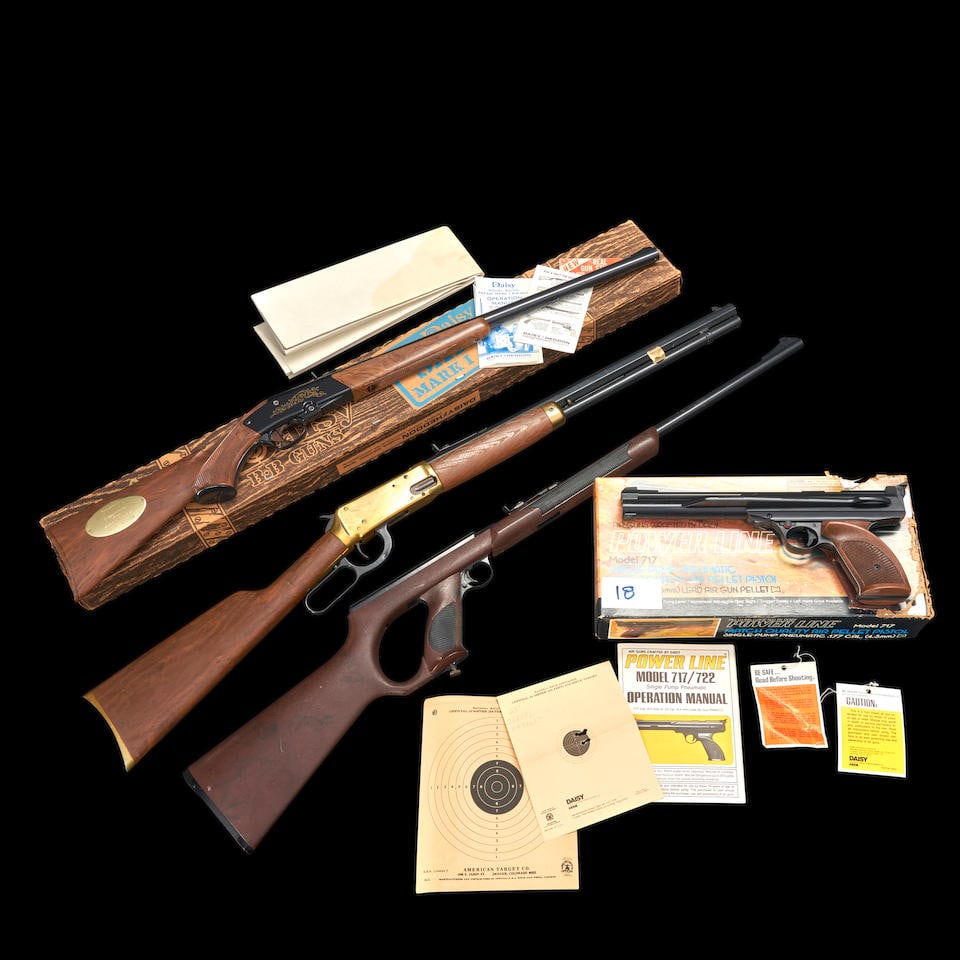 Four BB Guns,: Four BB Guns, late 20th century. A presentation Daisy Safari Mark I 86/70 rifle, Reg. No. L090224, with blued barrel and frame, wood grain plastic stock with brass plaque engraved 'Presented to/ROBERT
