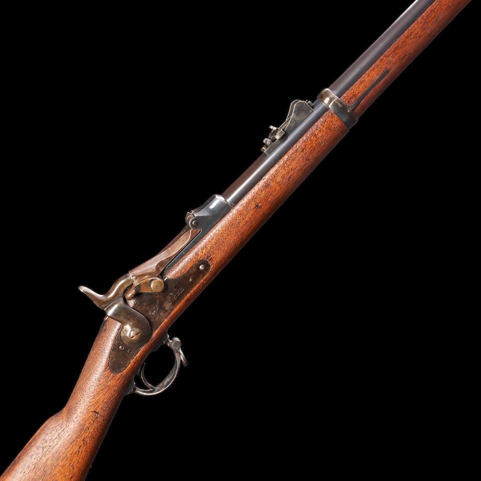 Springfield U.S. Model 1873 Trapdoor Rifle,: Springfield U.S. Model 1873 Trapdoor Rifle, 1887. Serial number 366632, .45-70 caliber, blued barrel with adjustable rear sight, Springfield lock, walnut stock having a 'SWP' cartouche that appears to