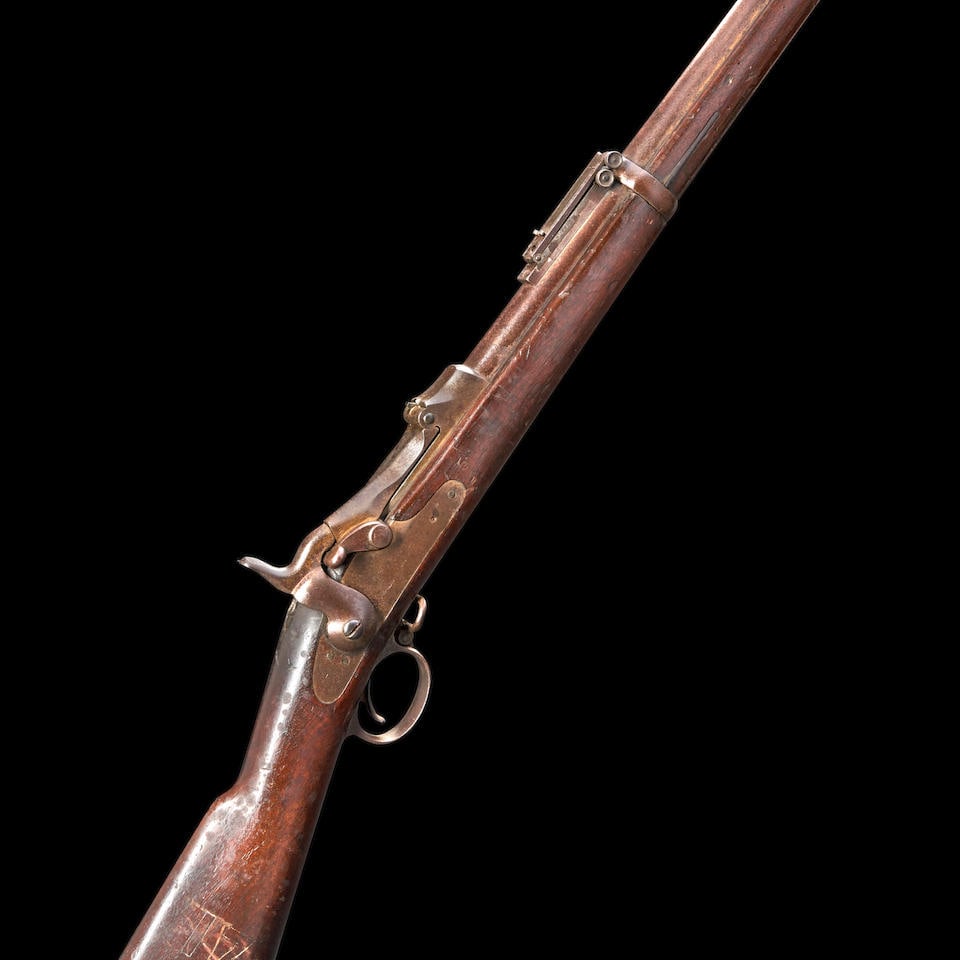 Springfield U.S. Model 1884 Trapdoor Rifle,: Springfield U.S. Model 1884 Trapdoor Rifle, 1892. Serial number 537883, .45-70 caliber, barrel with adjustable rear sight, lock with proper markings, walnut stock with trace of 1892-dated cartouche, b