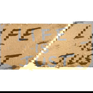 A prop sign from Bruce Almighty: A prop sign from Bruce Almighty Universal Pictures, 1993. A prop sign of brown card with black painted inscription, 'LIFE IS JUST.' Accompanied by a letter concerning the provenance. 12 x 24