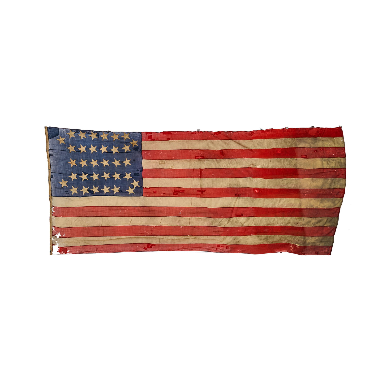 A U.S. 34-STAR 'PHALANX' CONVERSION FLAG. A handsewn pieced wool U.S. flag with applied cotton s... (1 of 1)