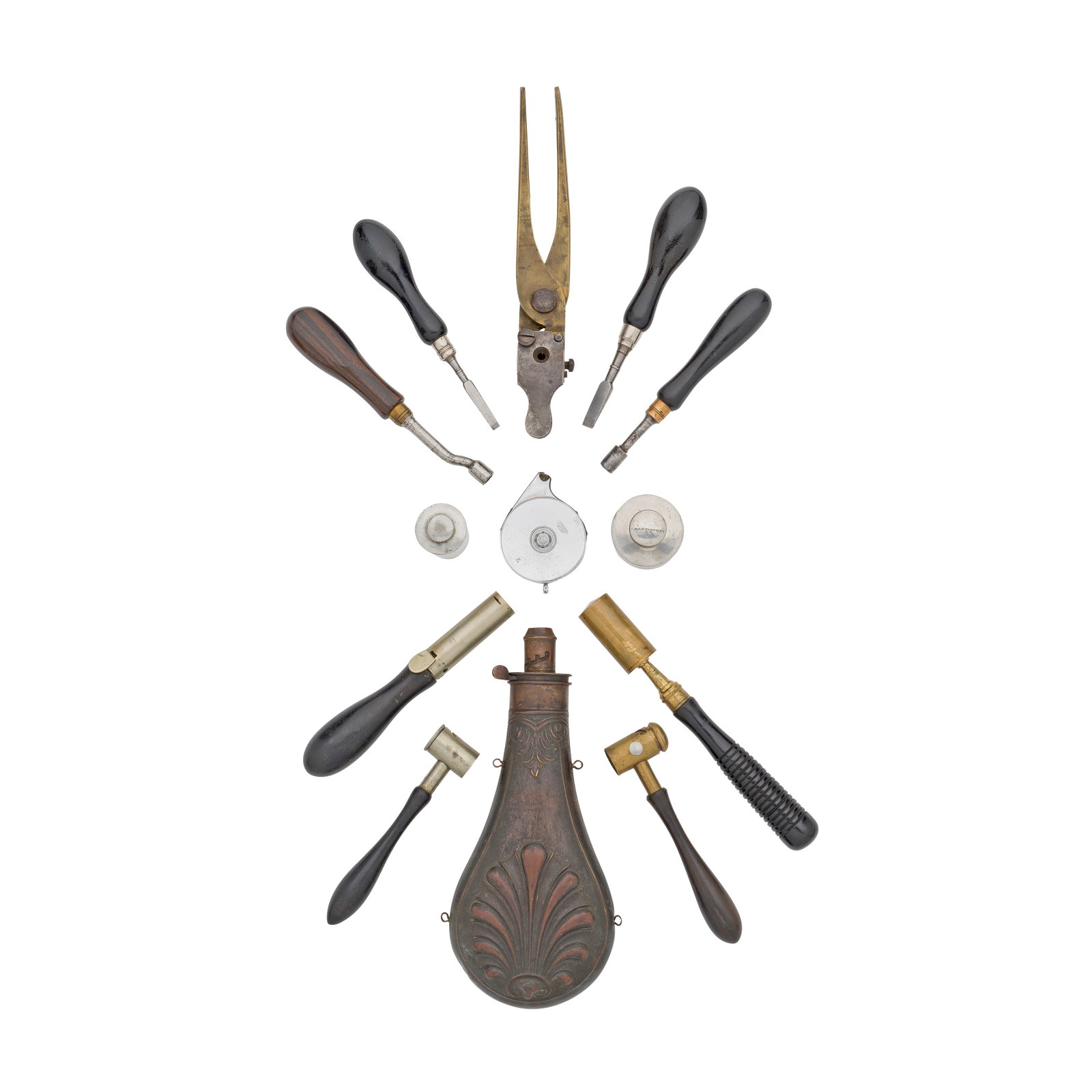 A Group Of Accessories Relating To Antique And Vintage Firearms: A Group Of Accessories Relating To Antique And Vintage Firearms 19th Century Comprising a circular bright steel percussion cap dispenser, the threaded lid stamped 'G. & J.W. Hawksley'; a brass bullet 