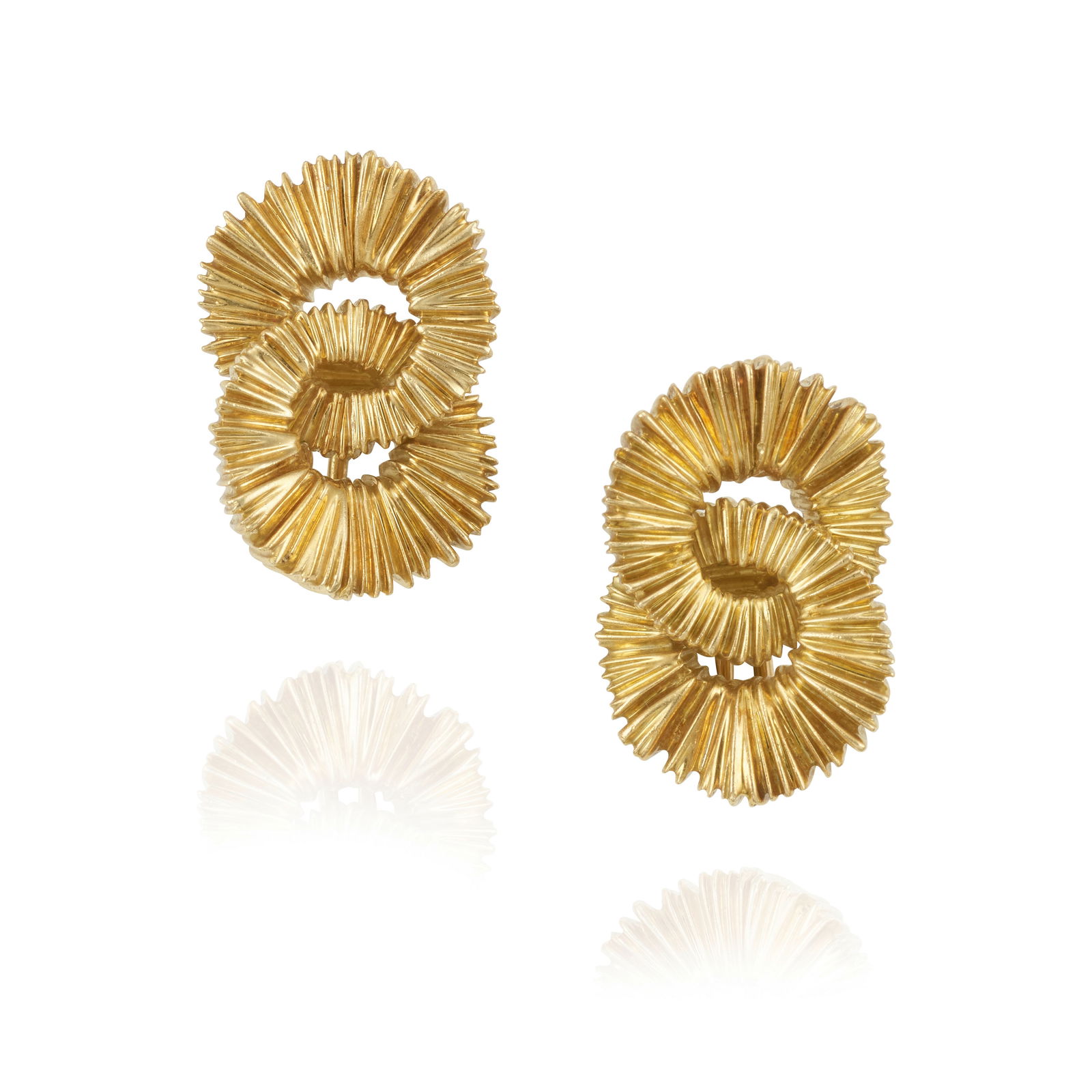 TIFFANY & CO.: A PAIR OF 18K GOLD EARCLIPS (1 of 2)