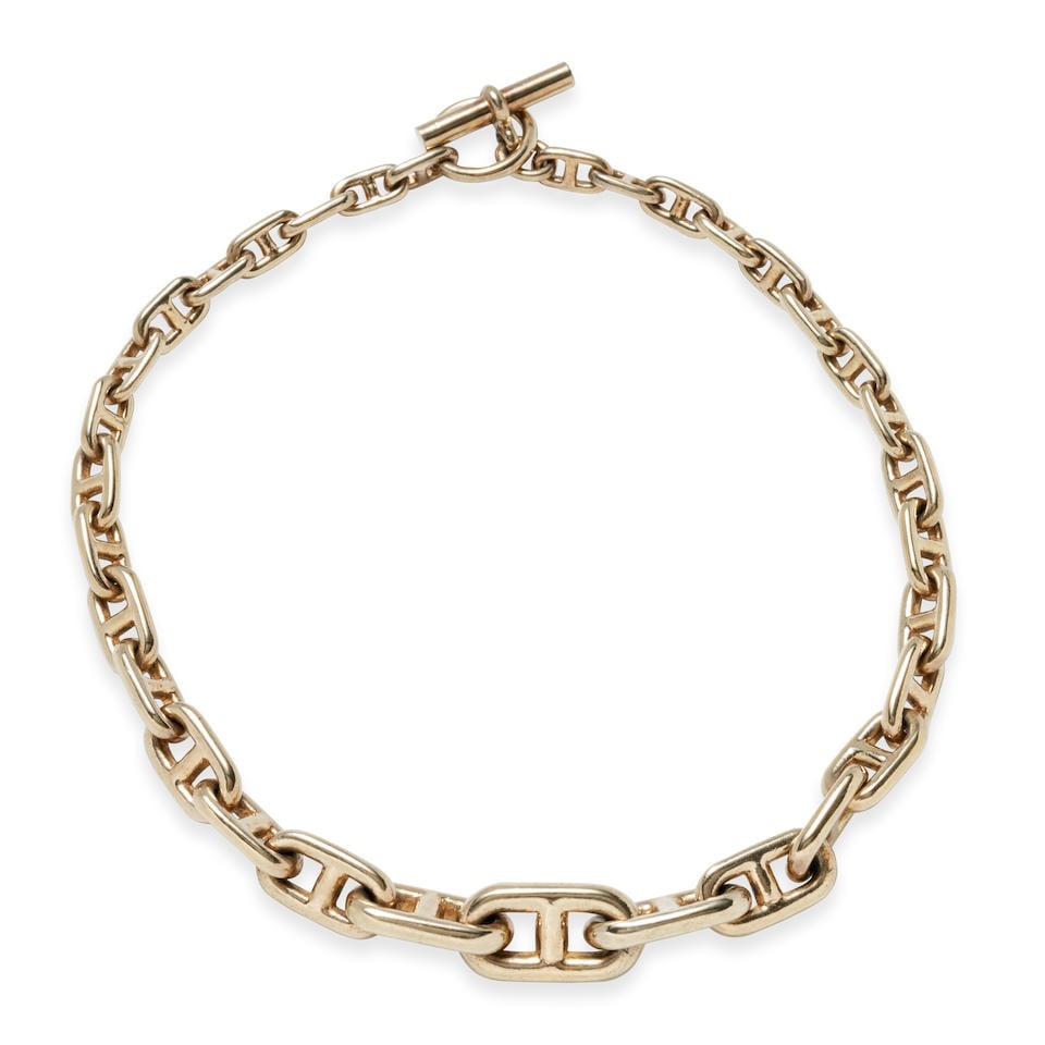 HERMES: A SILVER GILT ANCHOR CHAIN, FRANCE: HERMES: A SILVER GILT ANCHOR CHAIN, FRANCE With toggle closure, signed Hermes, Made in France, French maker's mark and guarantee stamps, length 17 1/4 in. For further information on this lot please v