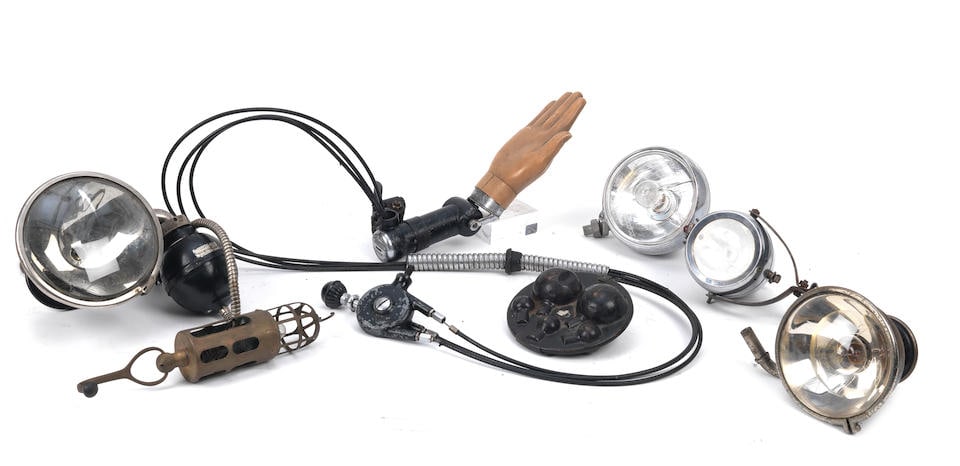 A 1920s Birglow 'Auto Signal' indicator hand, and assorted electric car lamps,   ((7)) (1 of 1)