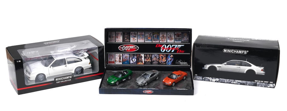 Three boxed die-cast models by Minichamps, ((3)): Three boxed die-cast models by Minichamps, comprising two 1:18 scale models of 2001 BMW M3 GTR 'Street' and 1988 Ford Sierra RS; and a box set of three 1:43 scale 'Bond Collection 007 40th Anniversary