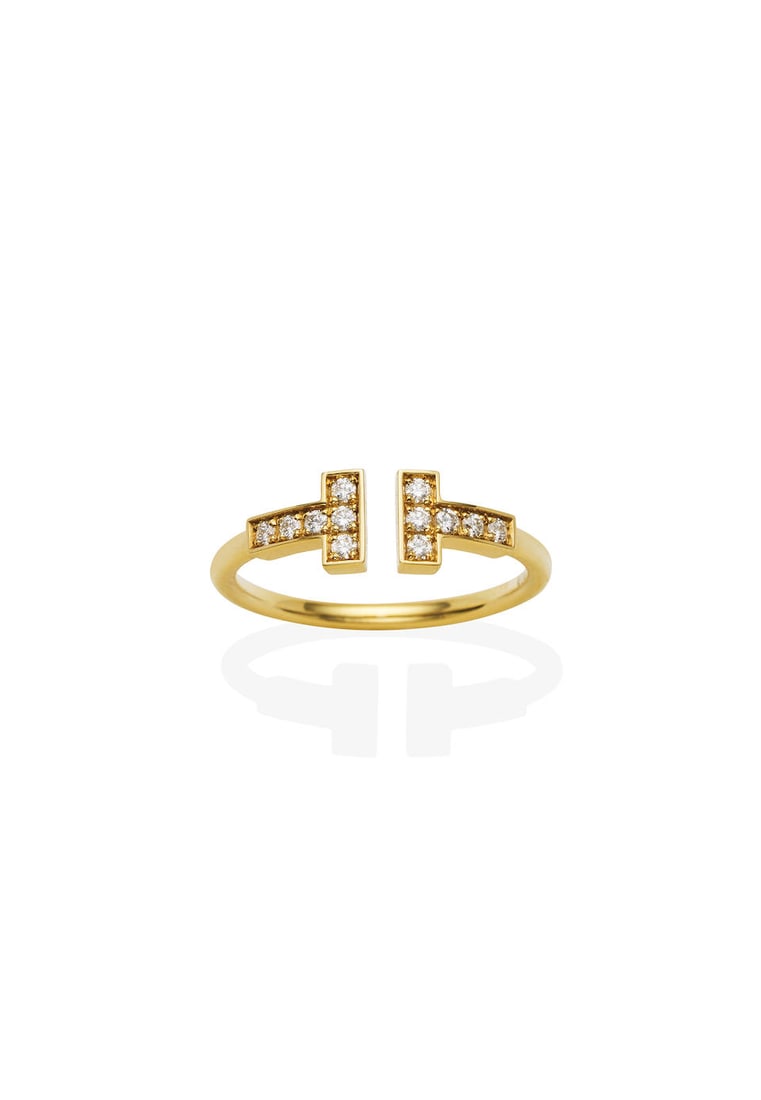 TIFFANY & CO. | 18CT GOLD AND DIAMOND 'TIFFANY T' RING: TIFFANY & CO. | 18CT GOLD AND DIAMOND 'TIFFANY T' RING The 'Diamond Wire Ring' set with round brilliant-cut diamonds, estimated total diamond weight 0.13 carats, singed Tiffany & Co., 18ct yellow gold