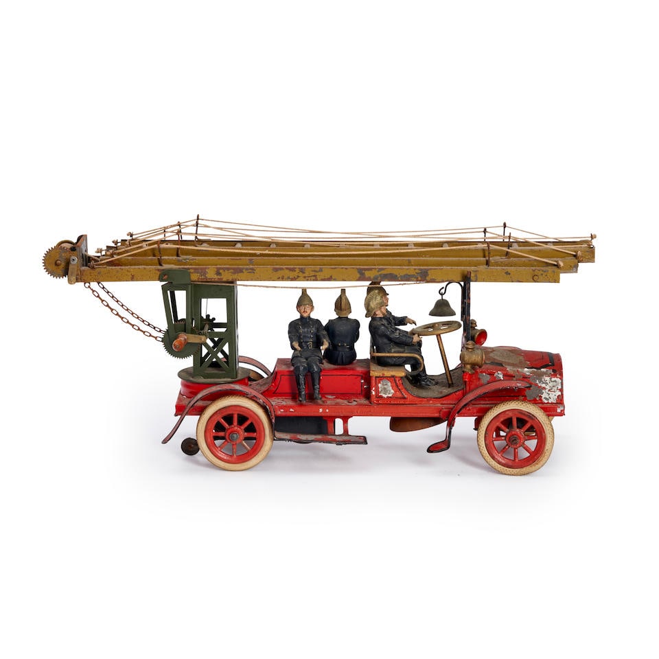 Probably S. Günthermann Co. (1887-1965), Nuremburg, Germany, Painted Tin Fire Engine with ...: Probably S. Günthermann Co. (1887-1965), Nuremburg, Germany, Painted Tin Fire Engine with Four Figures, c. 1912. Retractable fire escape ladder with operational hand crank, hand-painted composite