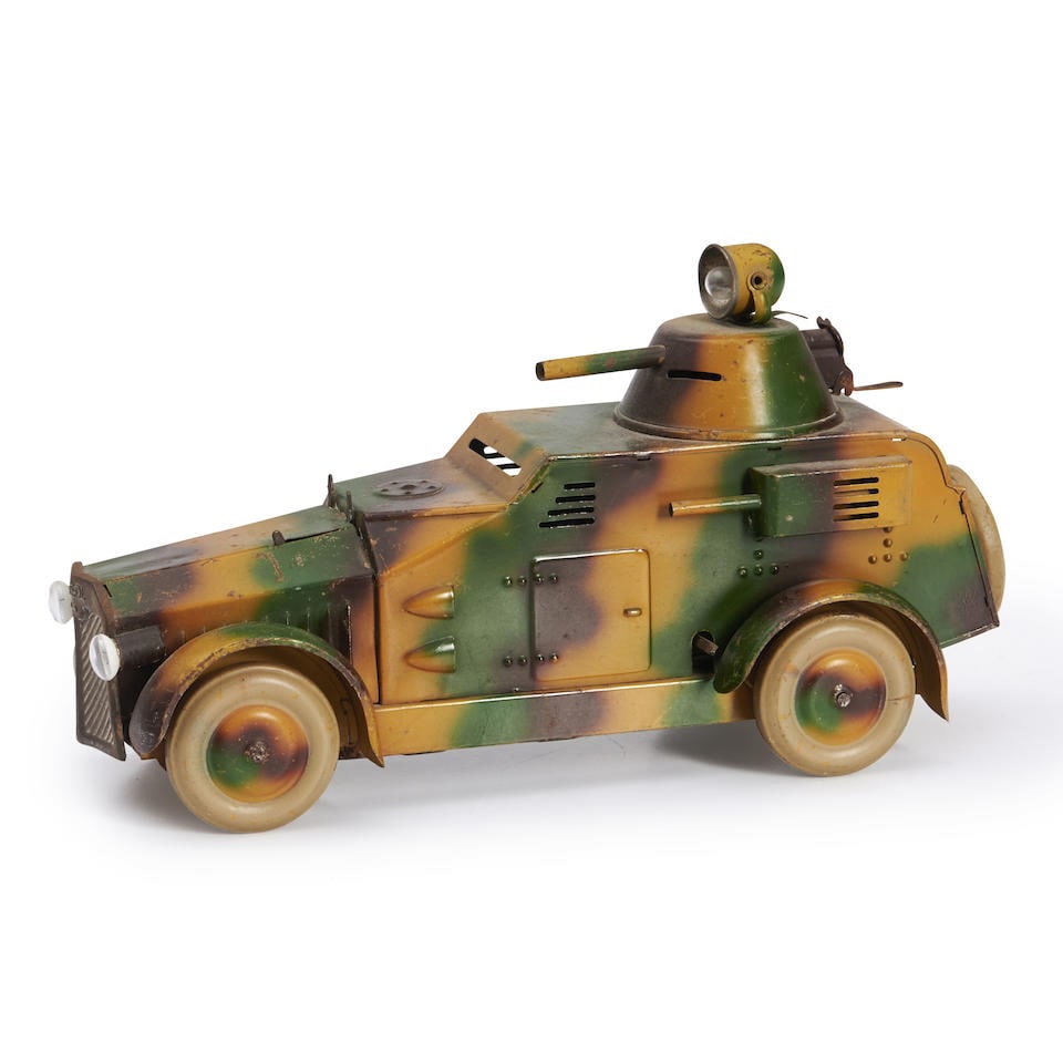 Lineol Co. (1906-43), Brandenburg, Germany, Tin Clockwork Model Armored Car, c. 1940.: Lineol Co. (1906-43), Brandenburg, Germany, Tin Clockwork Model Armored Car, c. 1940. Camouflage-decorated tabbed tin model car with searchlight mounted over swiveling gun hatch, lg. 15 1/4, dp. 4 3/4