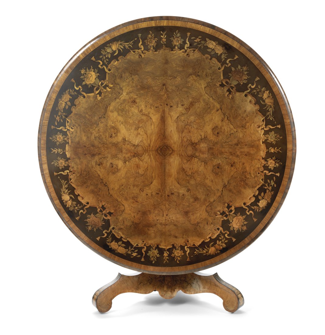 An early Victorian walnut, ebonised, tulipwood crossbanded, sycamore and fruitwood marquetry bre...: An early Victorian walnut, ebonised, tulipwood crossbanded, sycamore and fruitwood marquetry breakfast table Circa 1845, possibly retailed by Edward Holmes Baldock The circular quarter veneered tilt-t