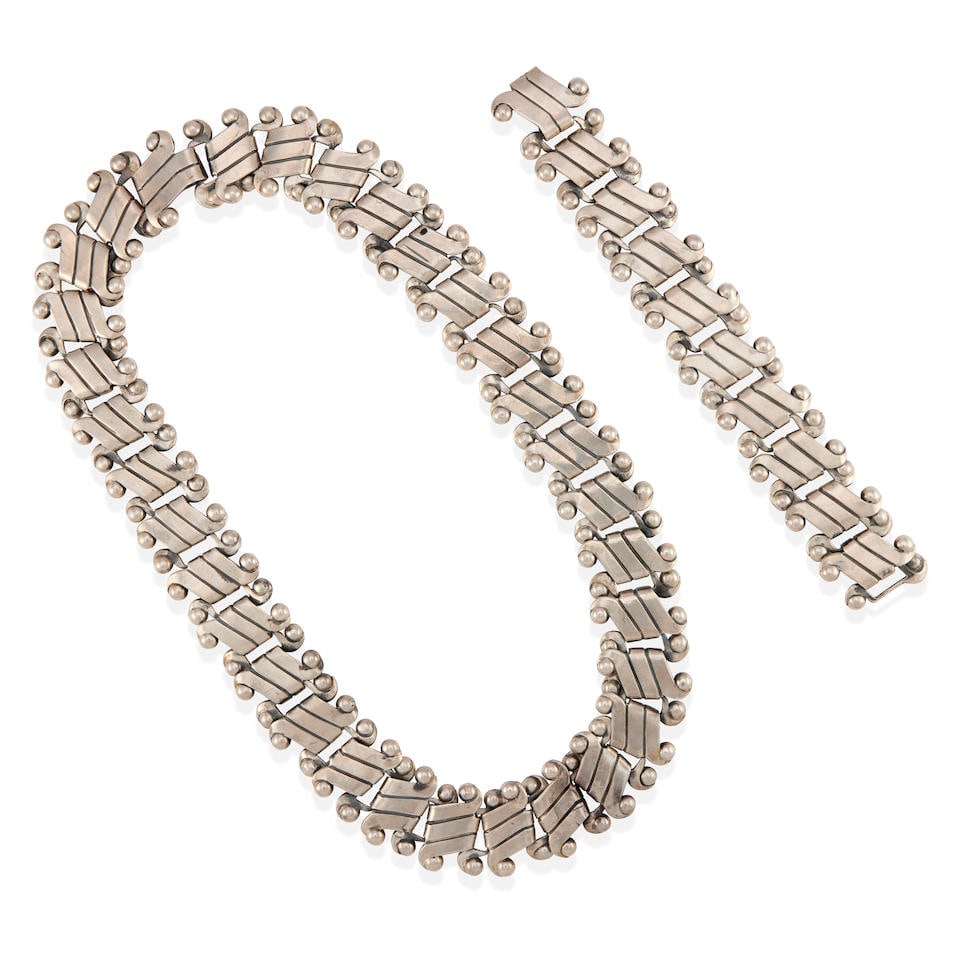 WILLIAM SPRATLING: A SILVER NECKLACE AND BRACELET SET (1 of 2)