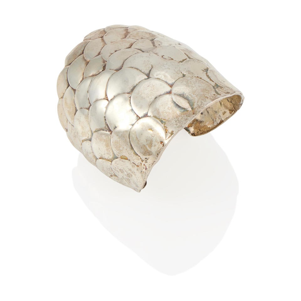 ROBERT LEE MORRIS: A SILVER 'SCALES' CUFF BRACELET: ROBERT LEE MORRIS: A SILVER 'SCALES' CUFF BRACELET • Silver • Hand inscribed Morris • Inner circumference 6 1/2 in., gap measures 1 1/4 in., width 2 7/8 in. • Estimated gross w