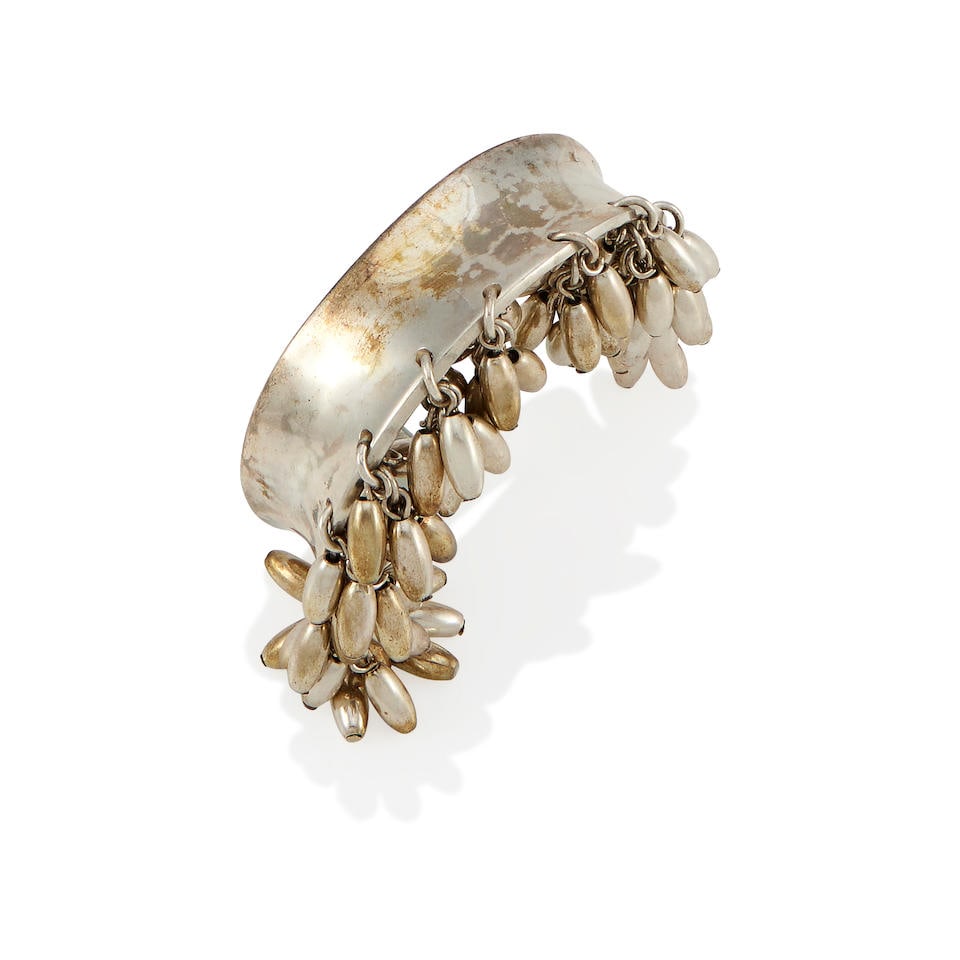 ROBERT LEE MORRIS: A SILVER FRINGE CUFF BRACELET, CIRCA 1997: ROBERT LEE MORRIS: A SILVER FRINGE CUFF BRACELET, CIRCA 1997 • Silver • Hand inscribed Robert Lee Morris, stamped RLM • Inner circumference 5 1/4 in., wrist opening 1 in. • Est