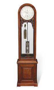 A good 19th century mahogany floorstanding regulator with off-set winding Thomas Armstrong & Bro.,: A good 19th century mahogany floorstanding regulator with off-set winding Thomas Armstrong & Bro., Manchester, No. 470 The arched case with escapement observation door to the upper right side above th