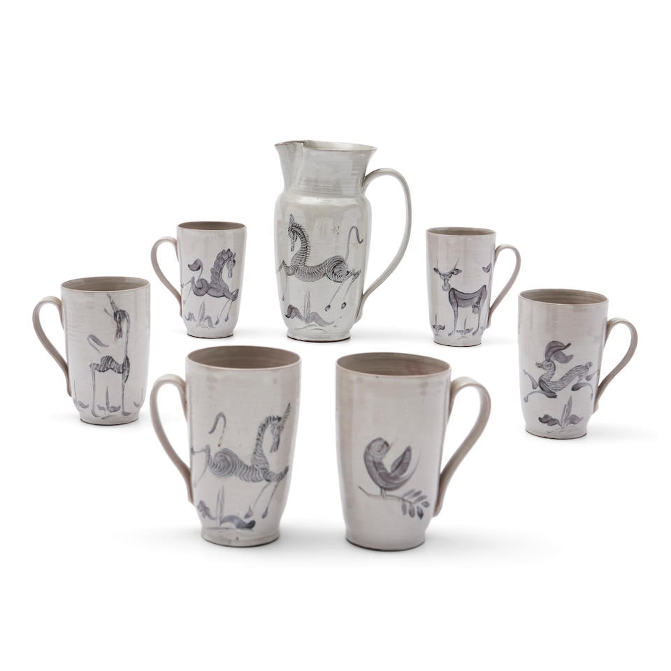 Edwin and Mary Scheier Studio Pottery Pitcher and Six Mugs, Durham, New Hampshire, c. 1945,: Edwin and Mary Scheier Studio Pottery Pitcher and Six Mugs, Durham, New Hampshire, c. 1945, all with incised signatures, pitcher decorated with zebras, ht. 9 3/4, each mug decorated with a different a