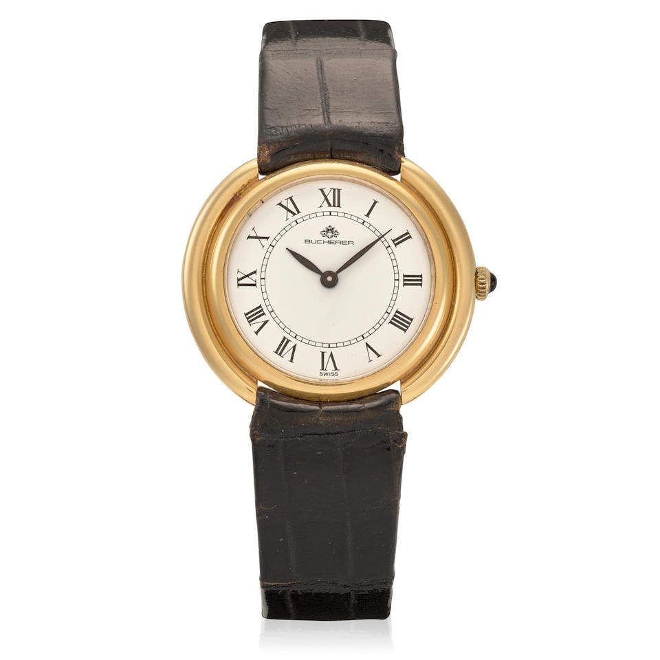 BUCHERER. AN 18K GOLD MANUAL WIND WRISTWATCHc. 1980s: BUCHERER. AN 18K GOLD MANUAL WIND WRISTWATCH Date: c. 1980s Movement: 17-jewel Cal. 2512 manual wind Dial: White, black Roman numeral hour markers, black inner minute track, black steel leaf hands Cas
