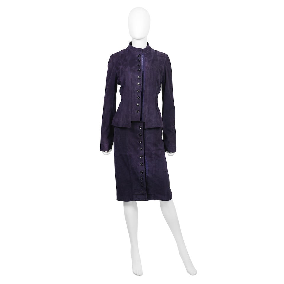 John Galliano for Christian Dior: a Purple Suede Ensemble 2003: John Galliano for Christian Dior: a Purple Suede Ensemble 2003 Comprising a jacket and knee-length skirt in purple goat suede with lace trim, and a pair of matching wool trousers (3) Condition Grade B