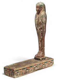 An Egyptian polychrome wood figure of Ptah-Sokar-Osiris: An Egyptian polychrome wood figure of Ptah-Sokar-Osiris Late Period, circa 664-332 B.C. 55cm high x 47cm long Footnotes: Provenance: Gifted ca. 1960s-70s to Elly Georgiadis (born ca.1913-d.1980s) whi