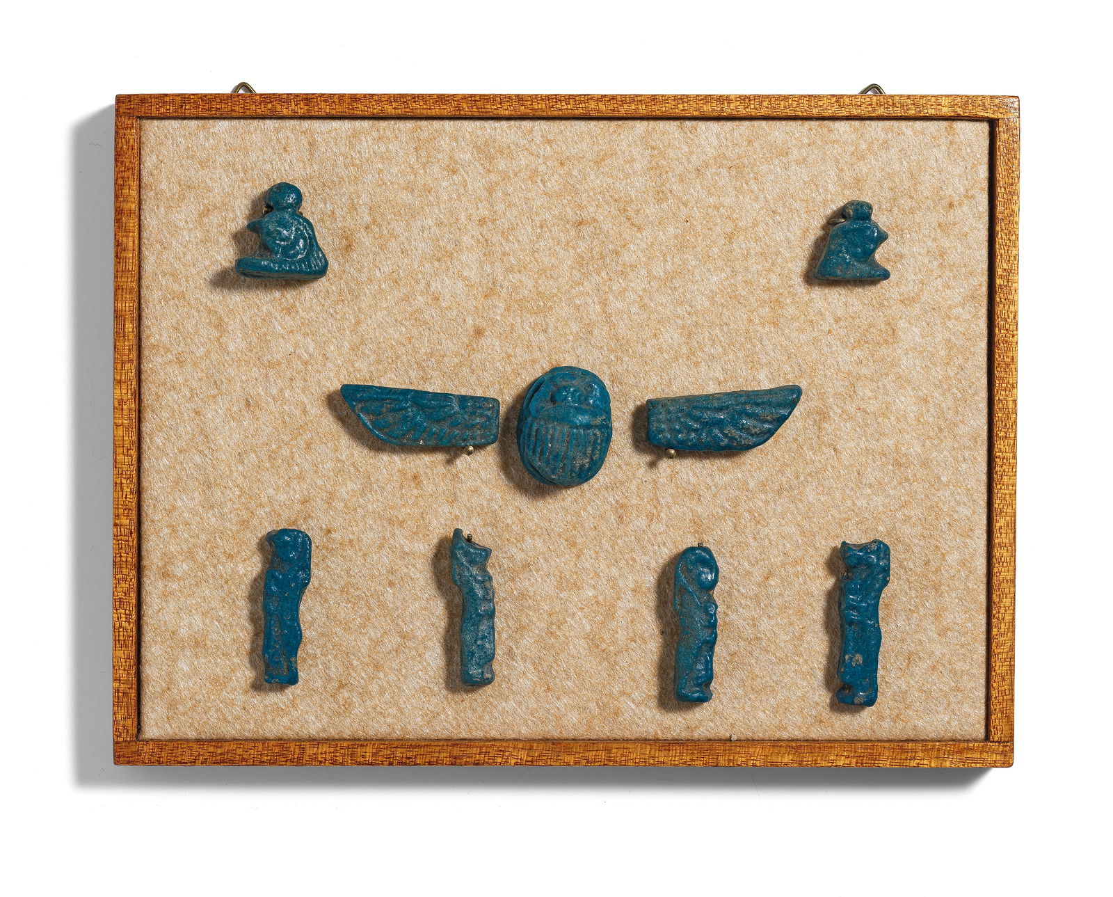 A framed group of Egyptian blue glazed faience amulets 9 (1 of 1)