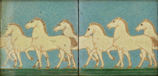 GRUEBY FAIENCE COMPANY (FOUNDED 1894) Two-Tile 'Horses' Panelcirca 1905decorated with white pran...: GRUEBY FAIENCE COMPANY (FOUNDED 1894) Two-Tile 'Horses' Panel circa 1905 decorated with white prancing horses in cuenca, glazed earthenware, framed 6 x 12in (15.2 x 30.48cm) Footnotes: Provenance Angu