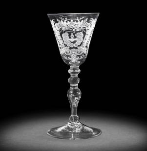 A good Dutch engraved light baluster marriage glass, circa 1750-60: A good Dutch engraved light baluster marriage glass, circa 1750-60The round funnel bowl finely decorated with a flaming heart above a pair of clasped hands emerging from voluminous clouds, all within