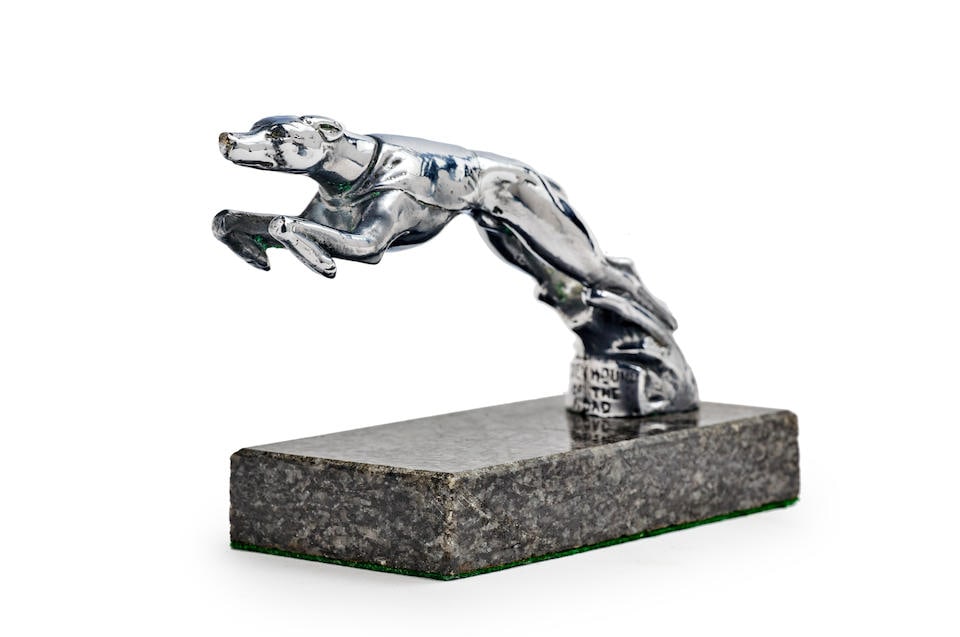 A GREYHOUND 'LEVRIER' MASCOT BY LOUIS LEJEUNE, 1950s,: A GREYHOUND 'LEVRIER' MASCOT BY LOUIS LEJEUNE, 1950s, based upon the mascot of A.C Automobiles for the years 1935 to 1939, marked in front of the base 'Greyhound of the road' and behind 'LL' (Louis Le