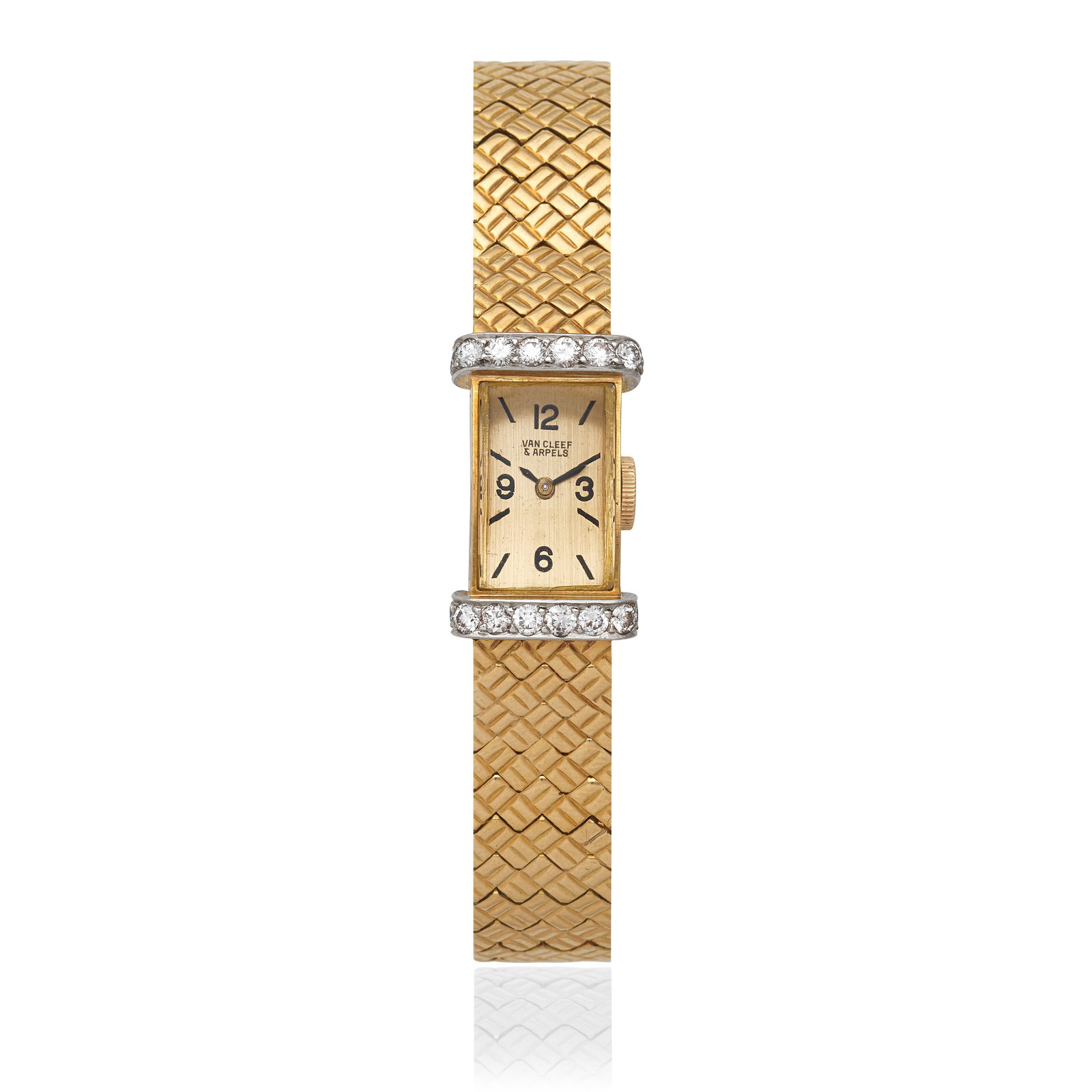 VAN CLEEF & ARPELS: DIAMOND-SET WATCH: VAN CLEEF & ARPELS: DIAMOND-SET WATCHThe rectangular dial with Arabic and baton hourmarkers, accented by brilliant-cut diamonds, dial signed Van Cleef & Arpels, numbered 16174, length 17.5cm