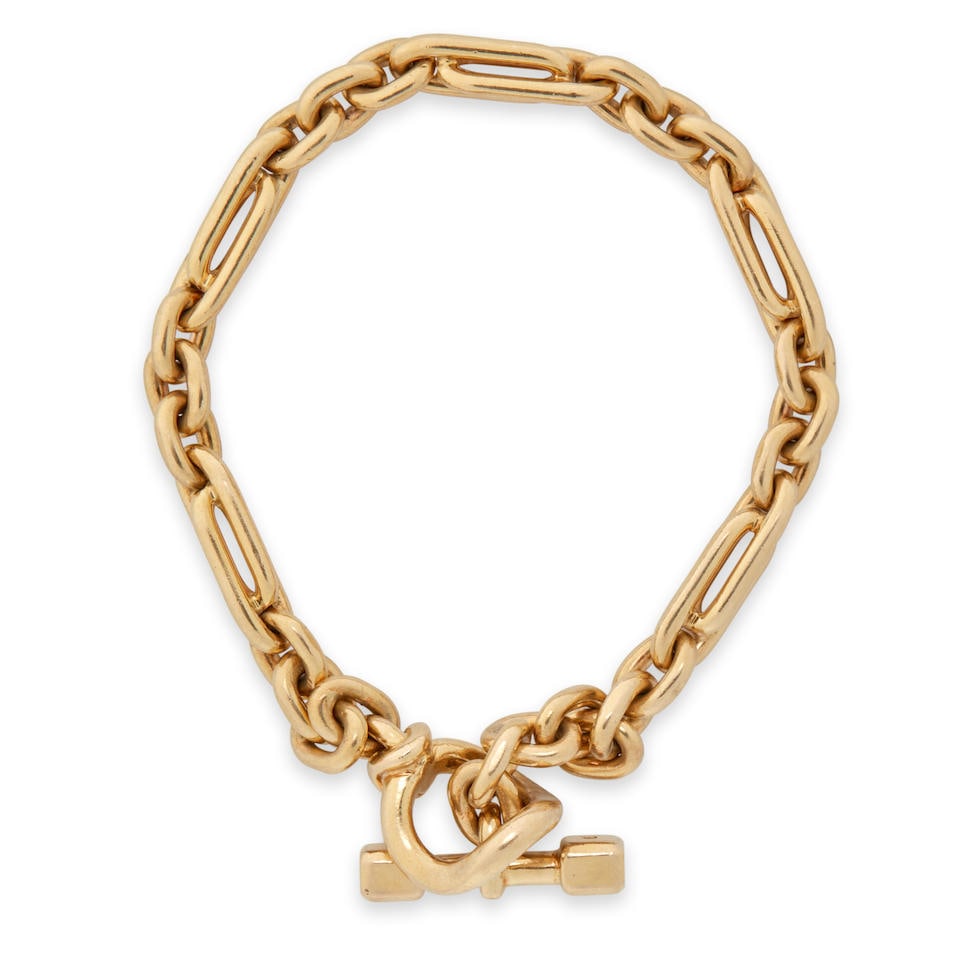 HERMES: AN 18K GOLD BRACELET, FRANCE (1 of 2)