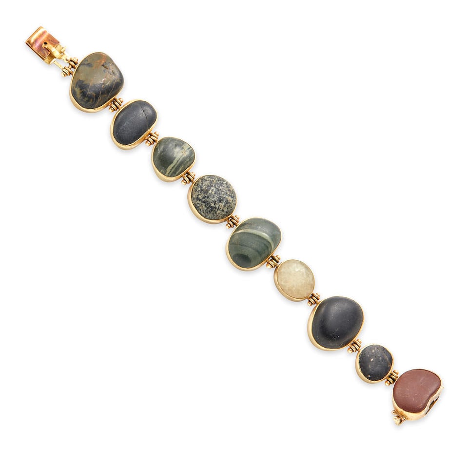 SAM SHAW: A GOLD, SILVER, AND BEACH STONE BRACELET: SAM SHAW: A GOLD, SILVER, AND BEACH STONE BRACELET The beach stones bezel set in 22k gold, 14k gold, and sterling silver, weight 38.3 dwt, signed Shaw, length 7 1/2 in. For further information on th