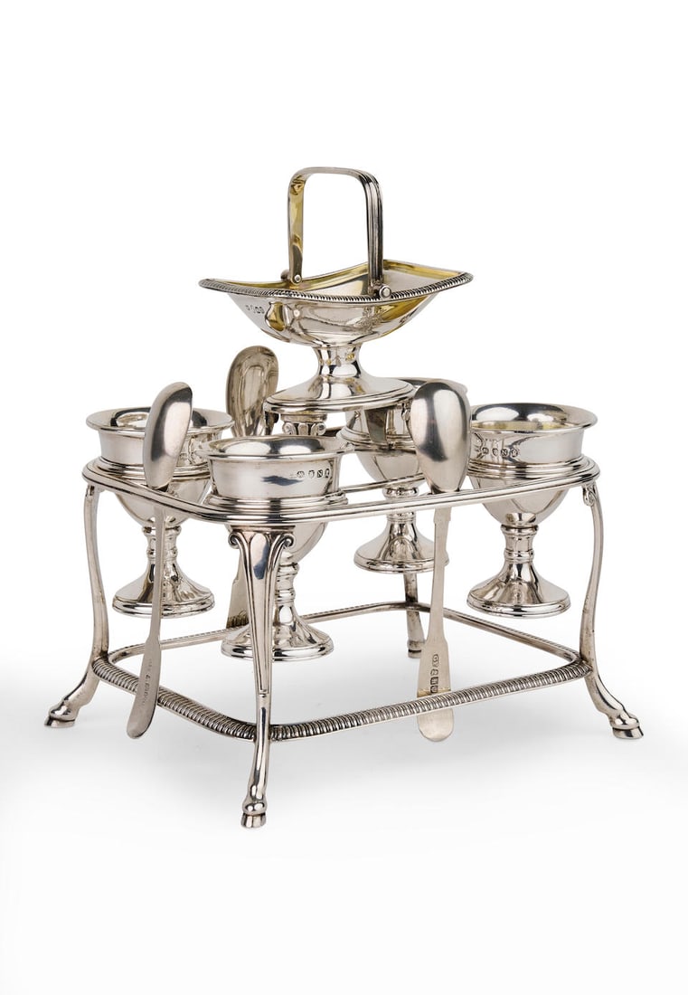 A George III sterling silver egg cruet: A George III sterling silver egg cruet hallmarked London 1808, maker Samuel Whitford, height 16.5 cm, weight 867 gm For further information on this lot please visit Bonhams.com For further informatio