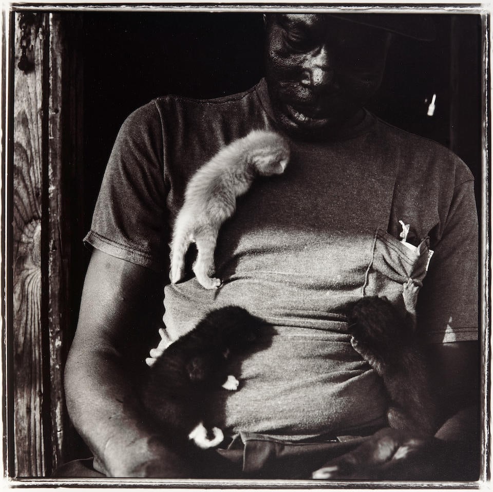 Keith Carter (born 1948); Raymond;: Keith Carter (born 1948) Raymond, 1991 Gelatin silver print; numbered, titled, and signed '22/50...Keith Carter 1991' in pencil on the verso. 14 3/4 x 14 3/4 in. (37.5 x 37.5 cm) sheet 20 x 16 in. (50