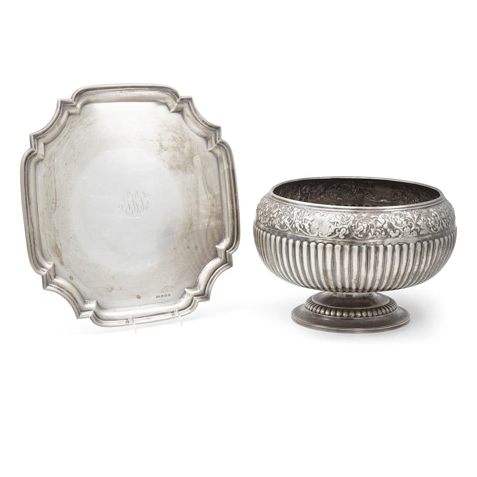 AN ENGLISH SILVER REPOUSSÉ CENTERPIECE BOWL by Charles Stuart Harris, London, 1885: AN ENGLISH SILVER REPOUSSÉ CENTERPIECE BOWL by Charles Stuart Harris, London, 1885 Together with an English silver tray by Viner's Ltd., Sheffield, 1936; height of bowl 7in (17.3cm); diameter 11i